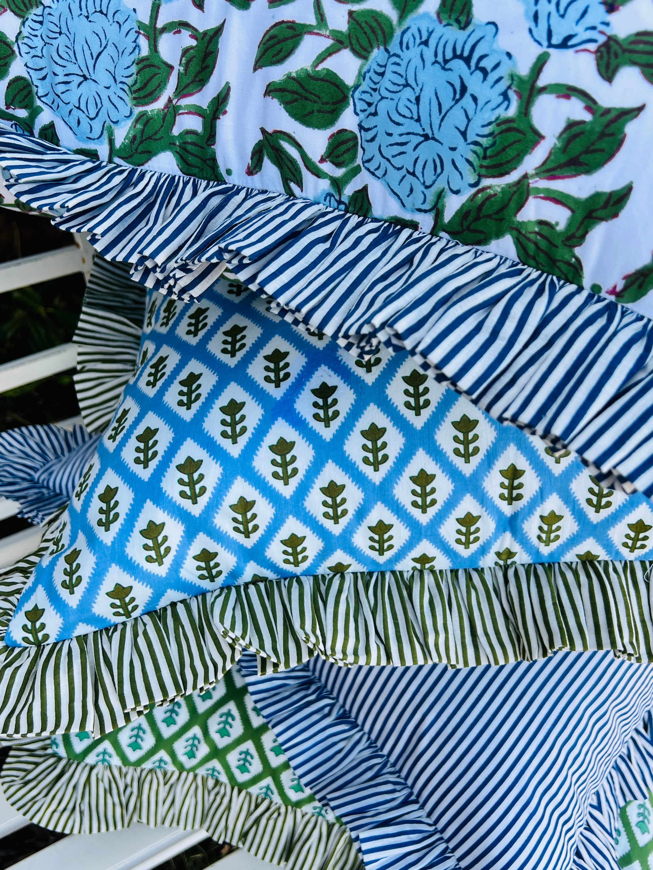 Blue and green floral block print pillow cover with ruffle trim
