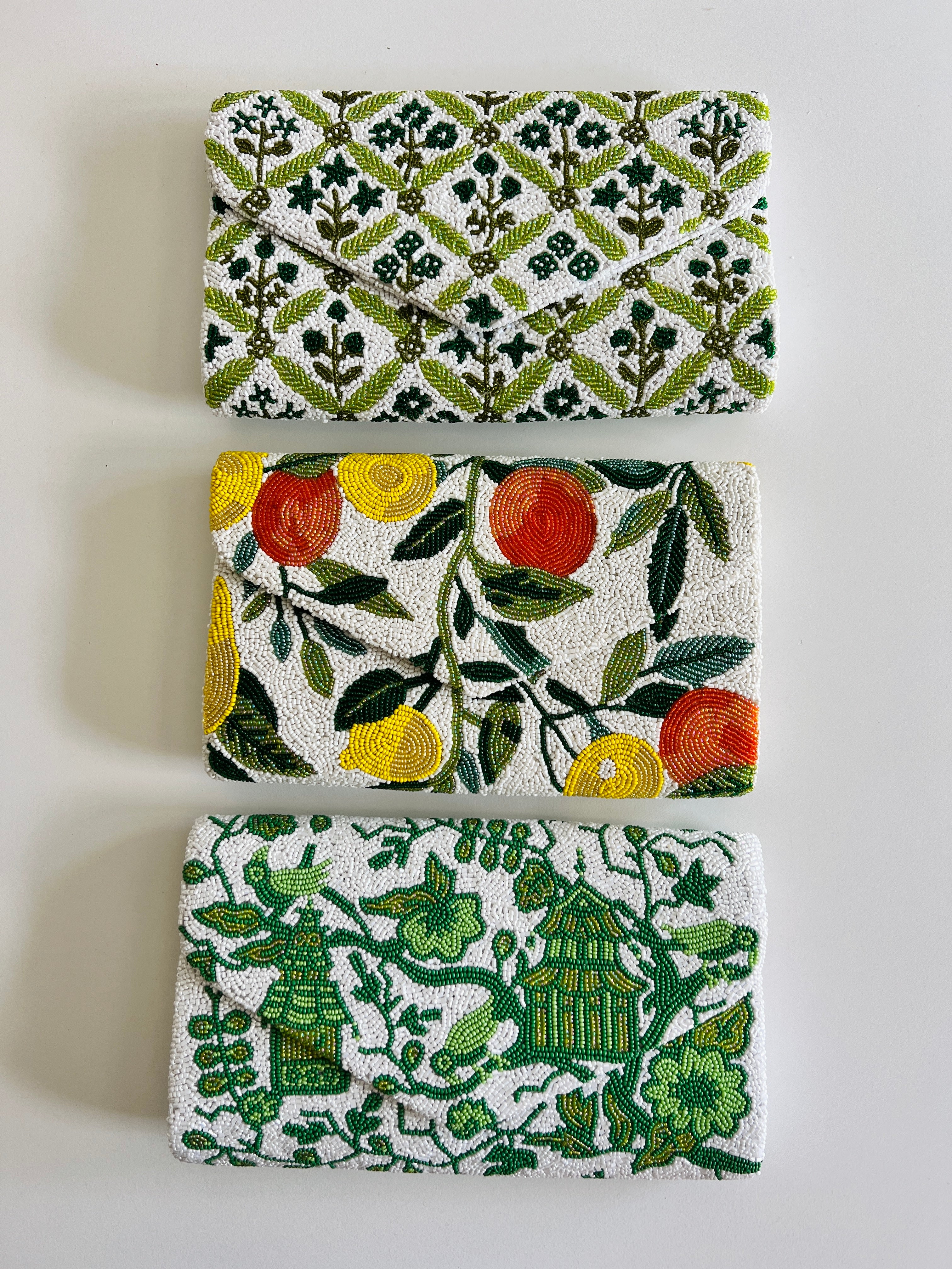 Hand beaded green and white block print floral trellis clutch
