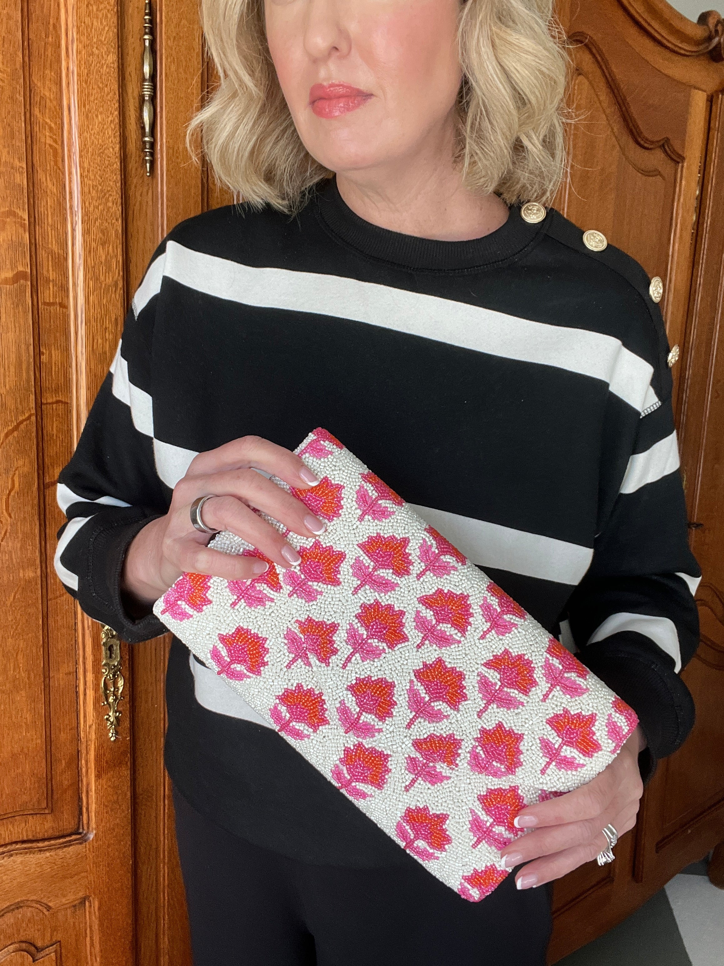 Hand beaded pink and orange block print floral trellis clutch
