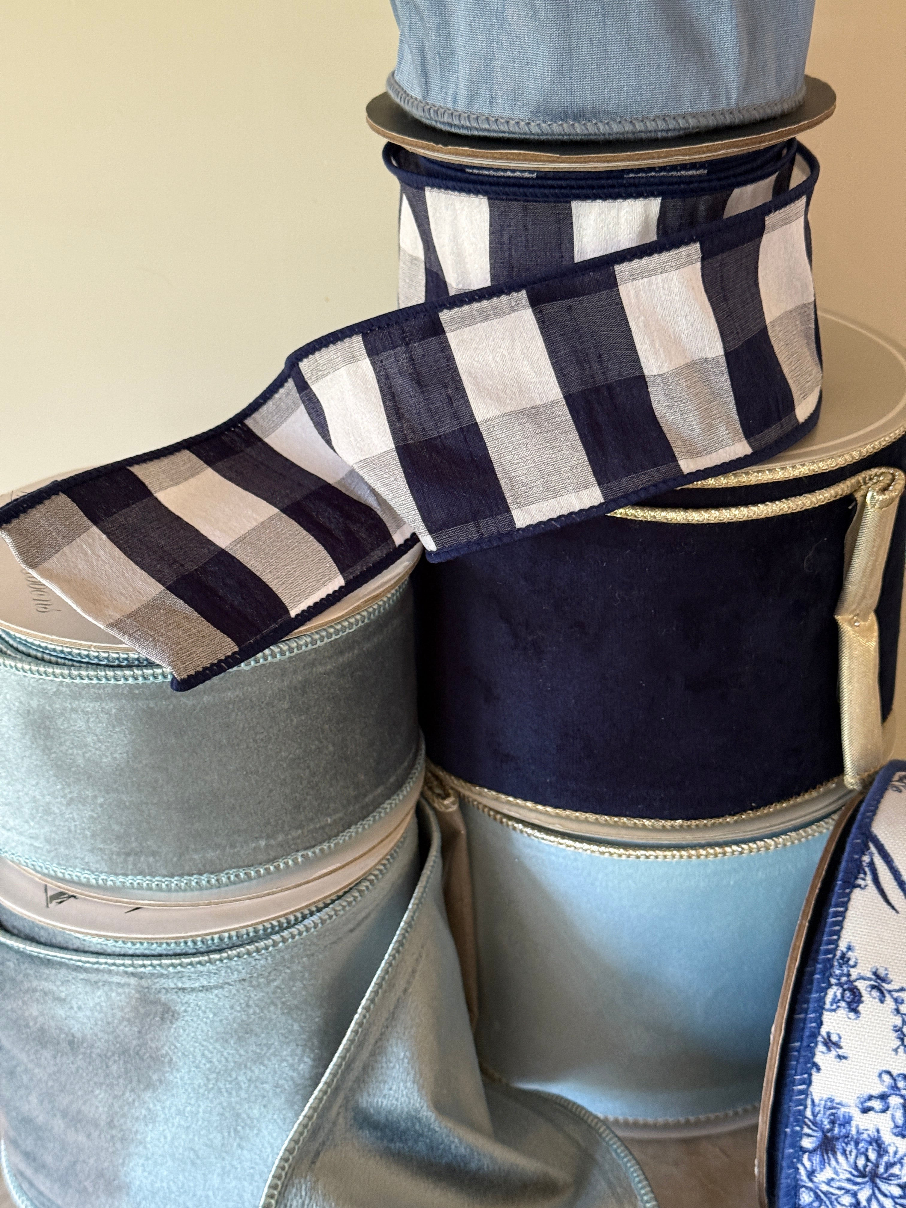 Navy velvet ribbon with gold backing, 4” wide x 10 yards