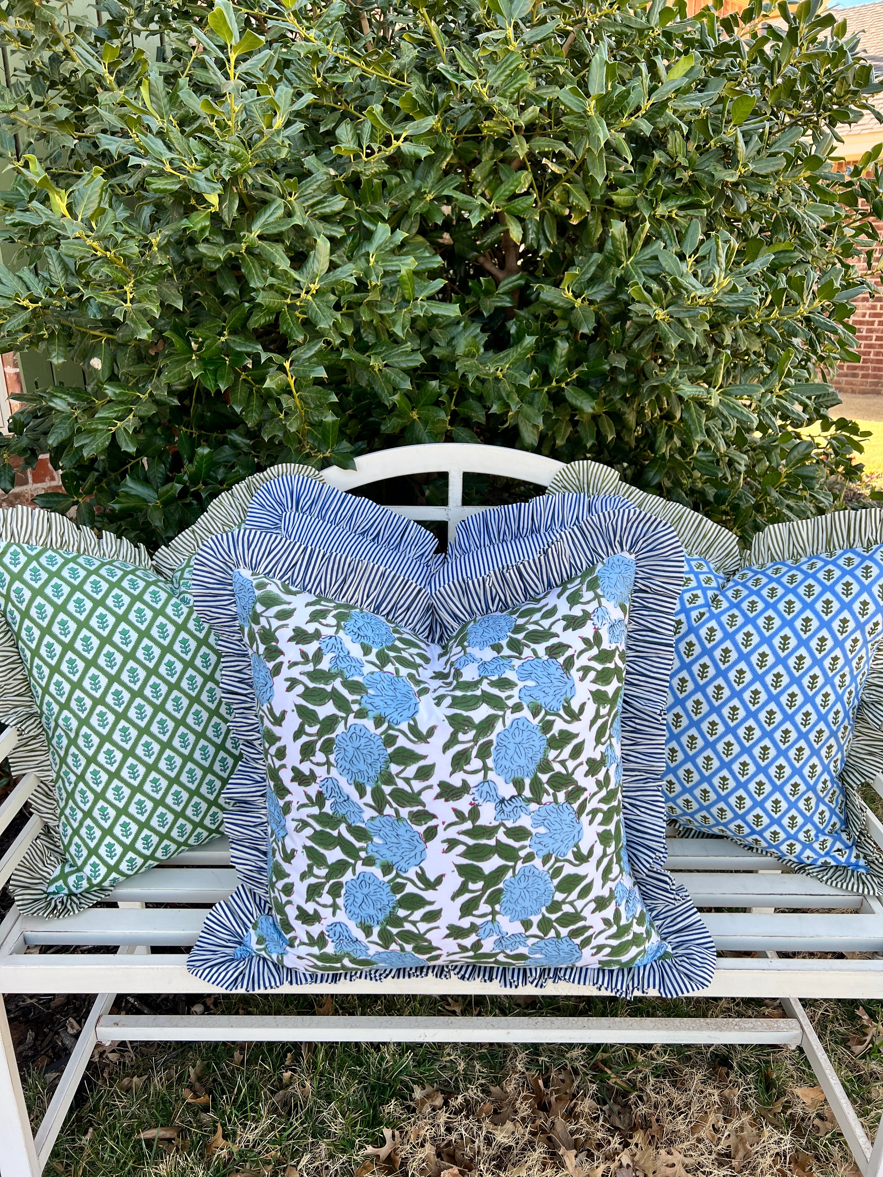 Blue and green floral block print pillow cover with ruffle trim