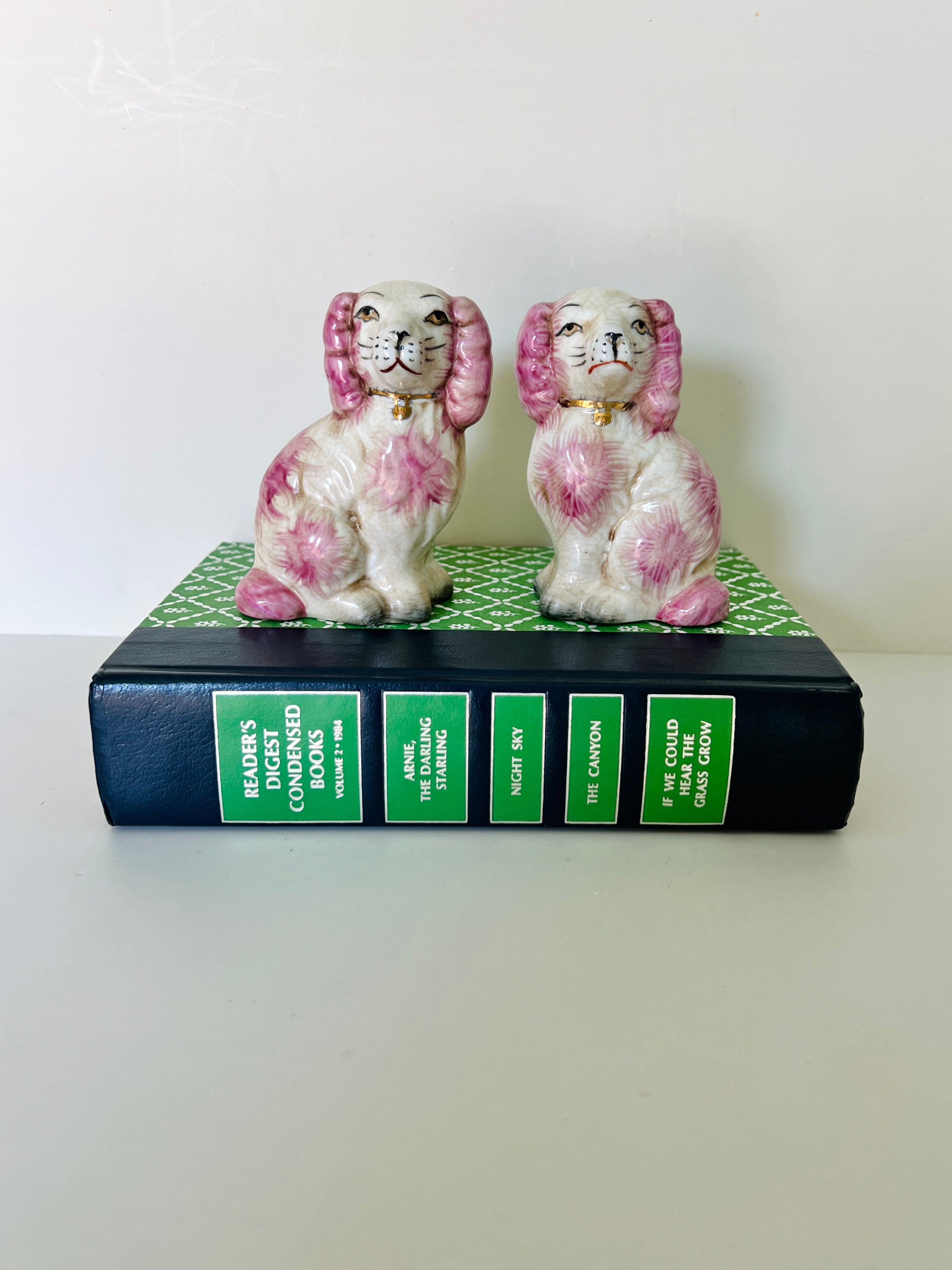 Mini pink porcelain Staffordshire dog figurine pair