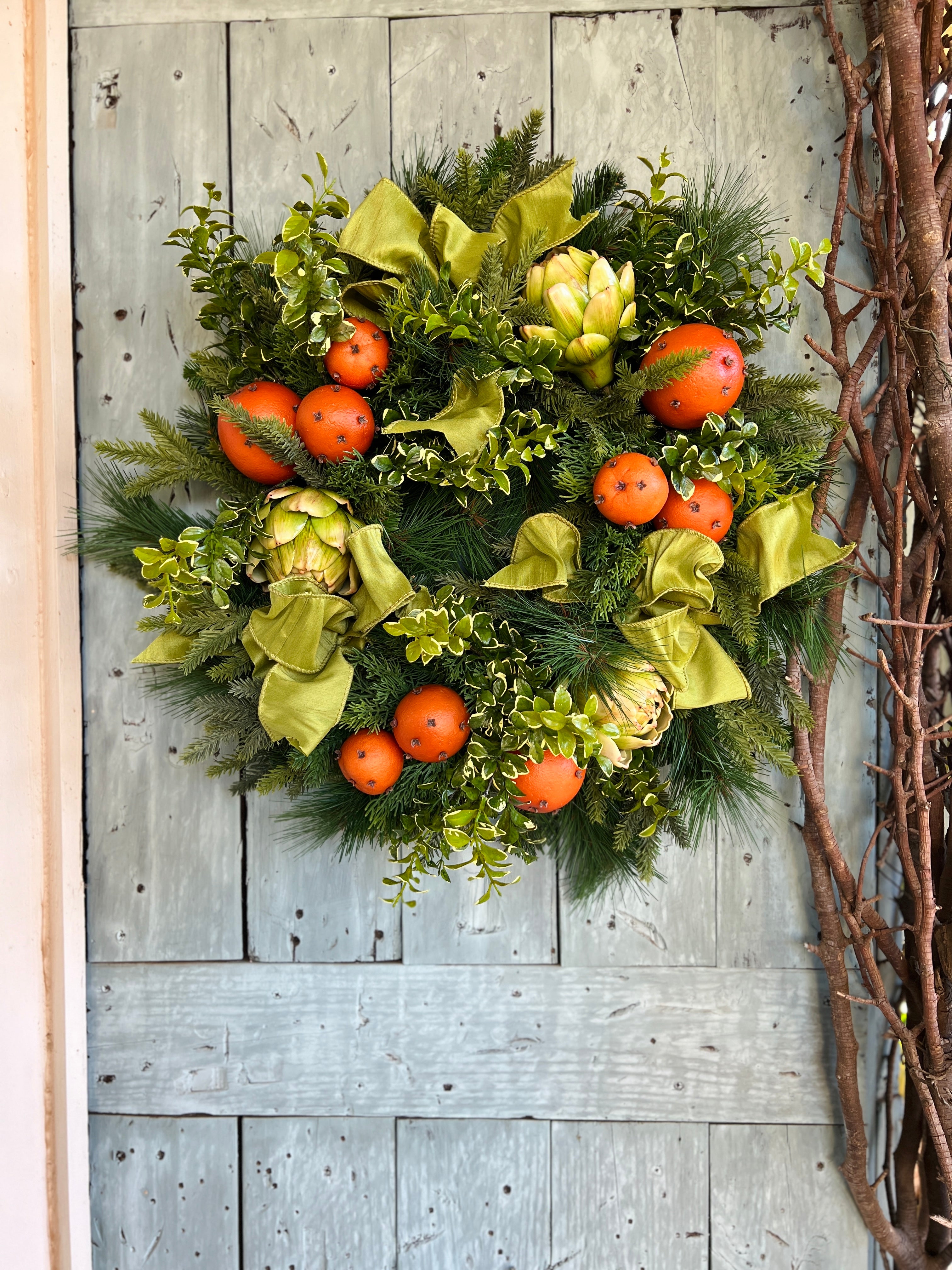 Orange pomander and artichoke wreath