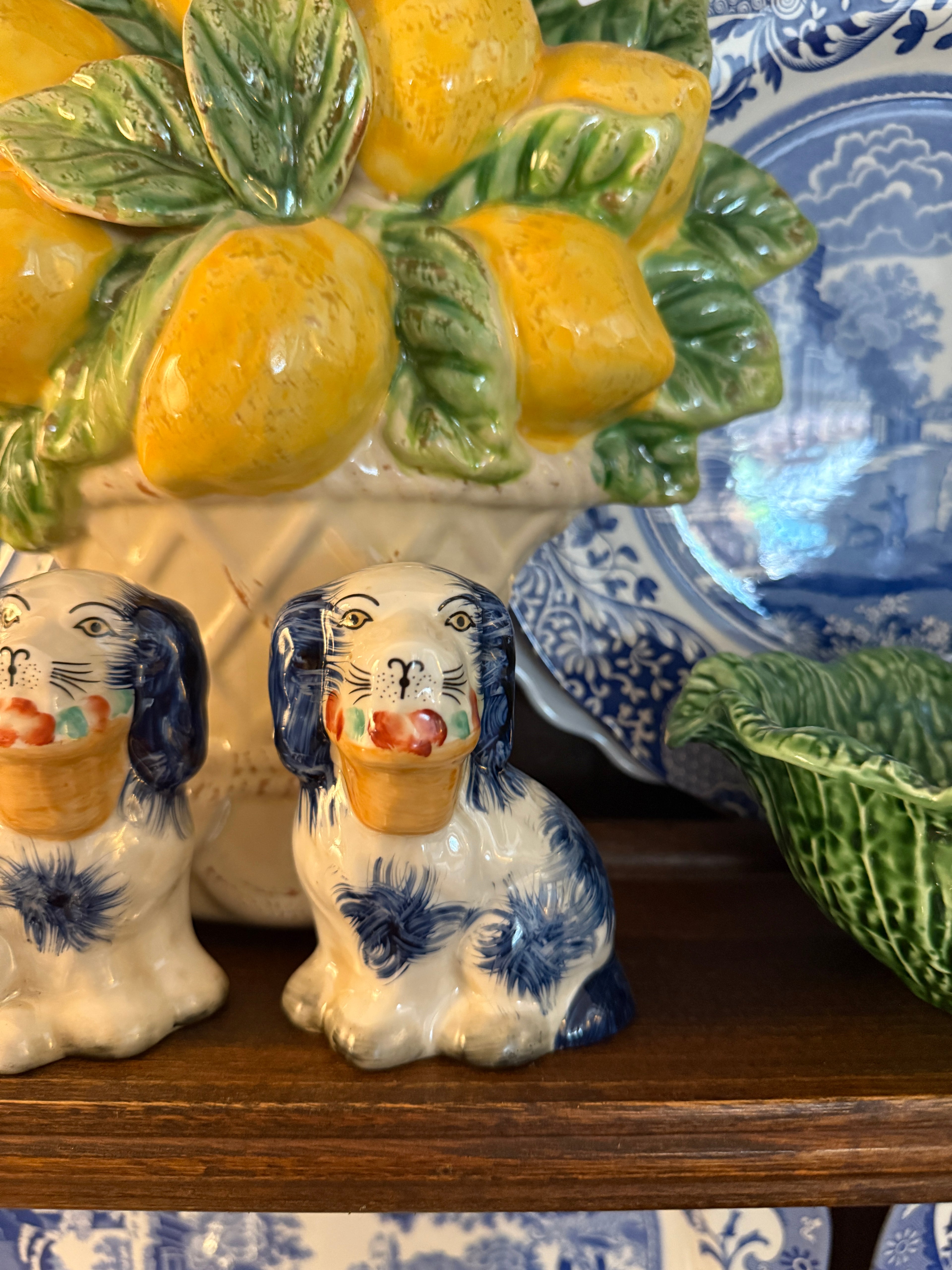 Mini blue porcelain Staffordshire dogs with flower baskets figurine pair