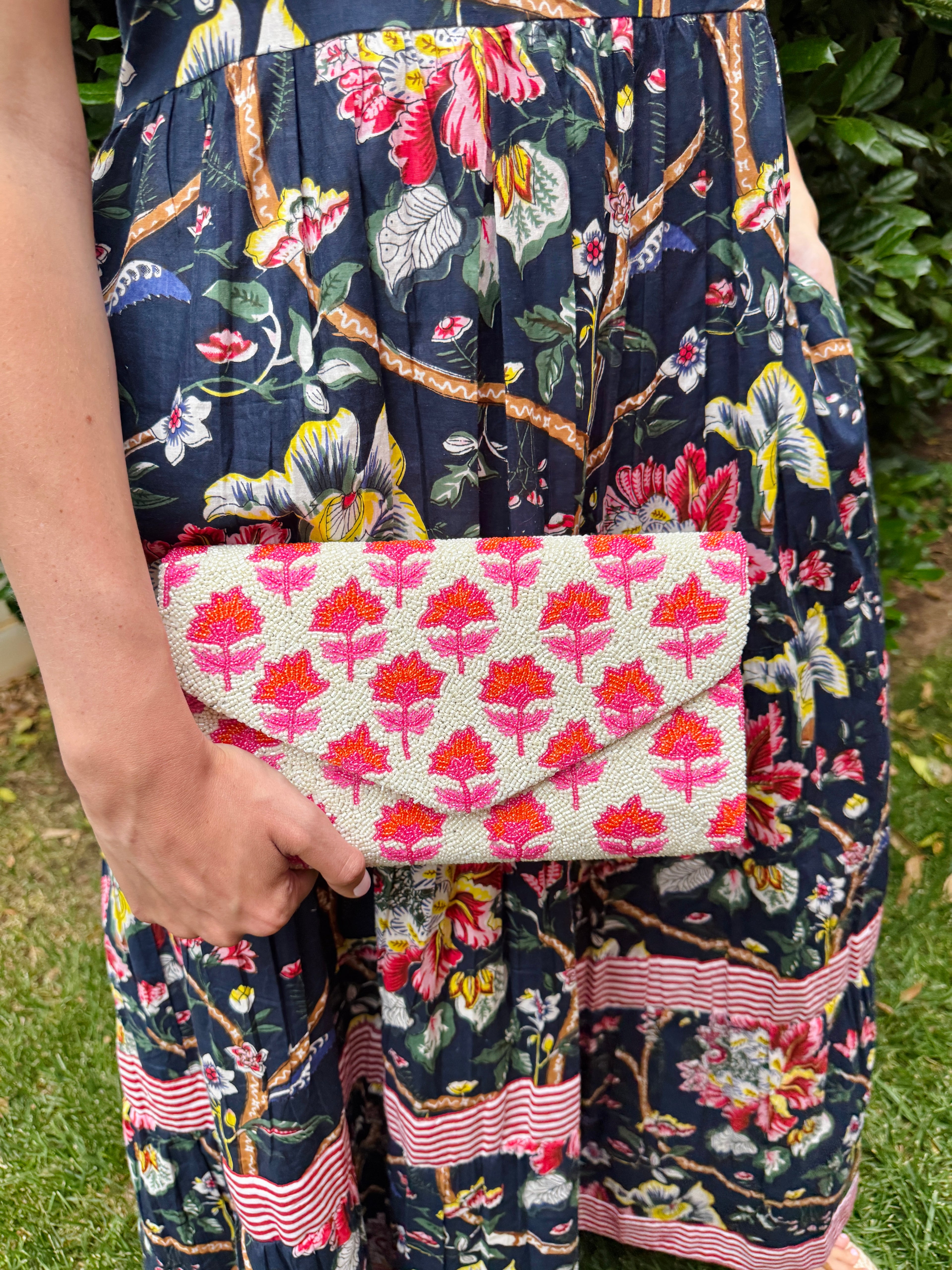 Hand beaded pink and orange block print floral trellis clutch