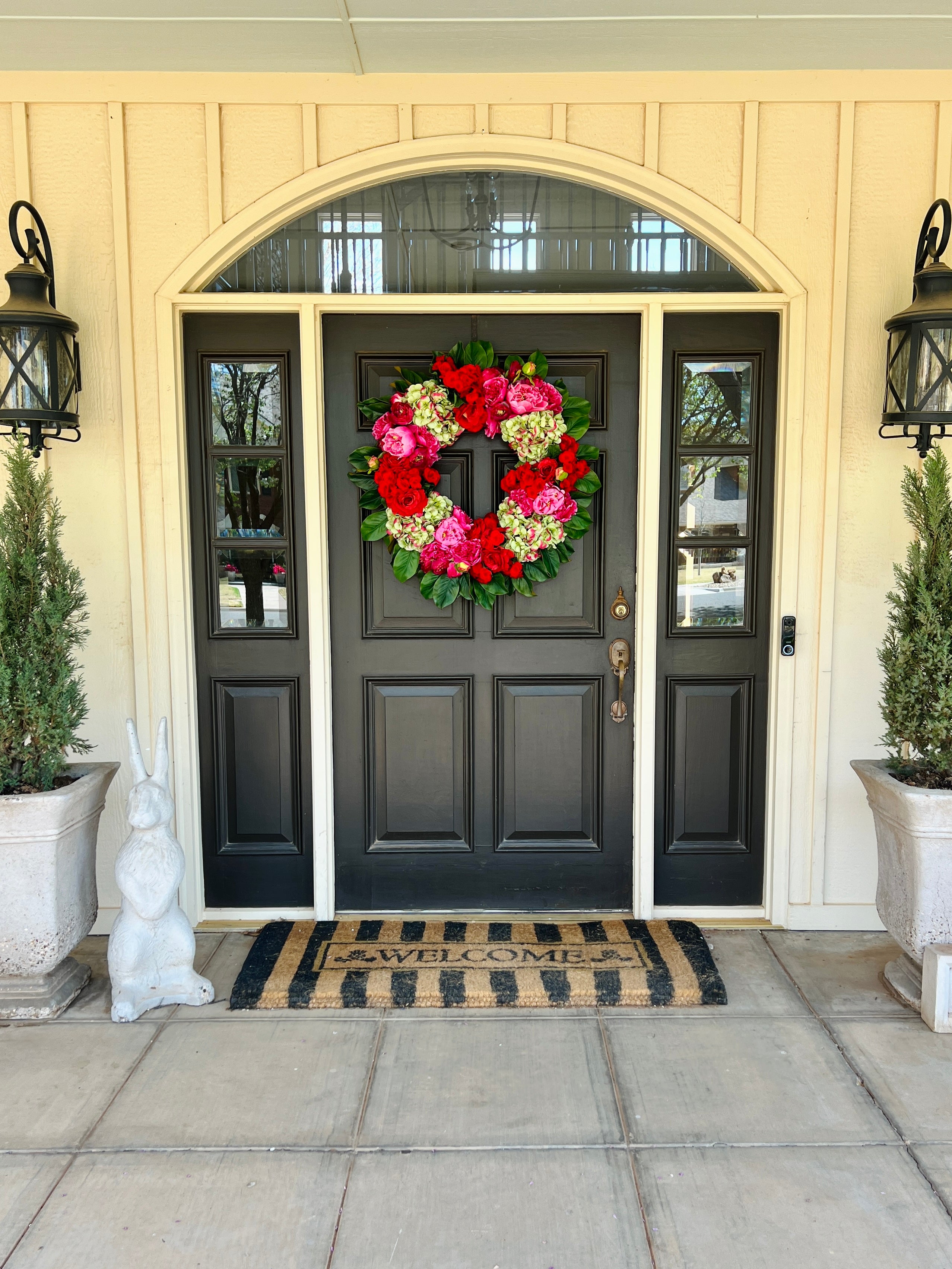 Pink, green, and red floral wreath