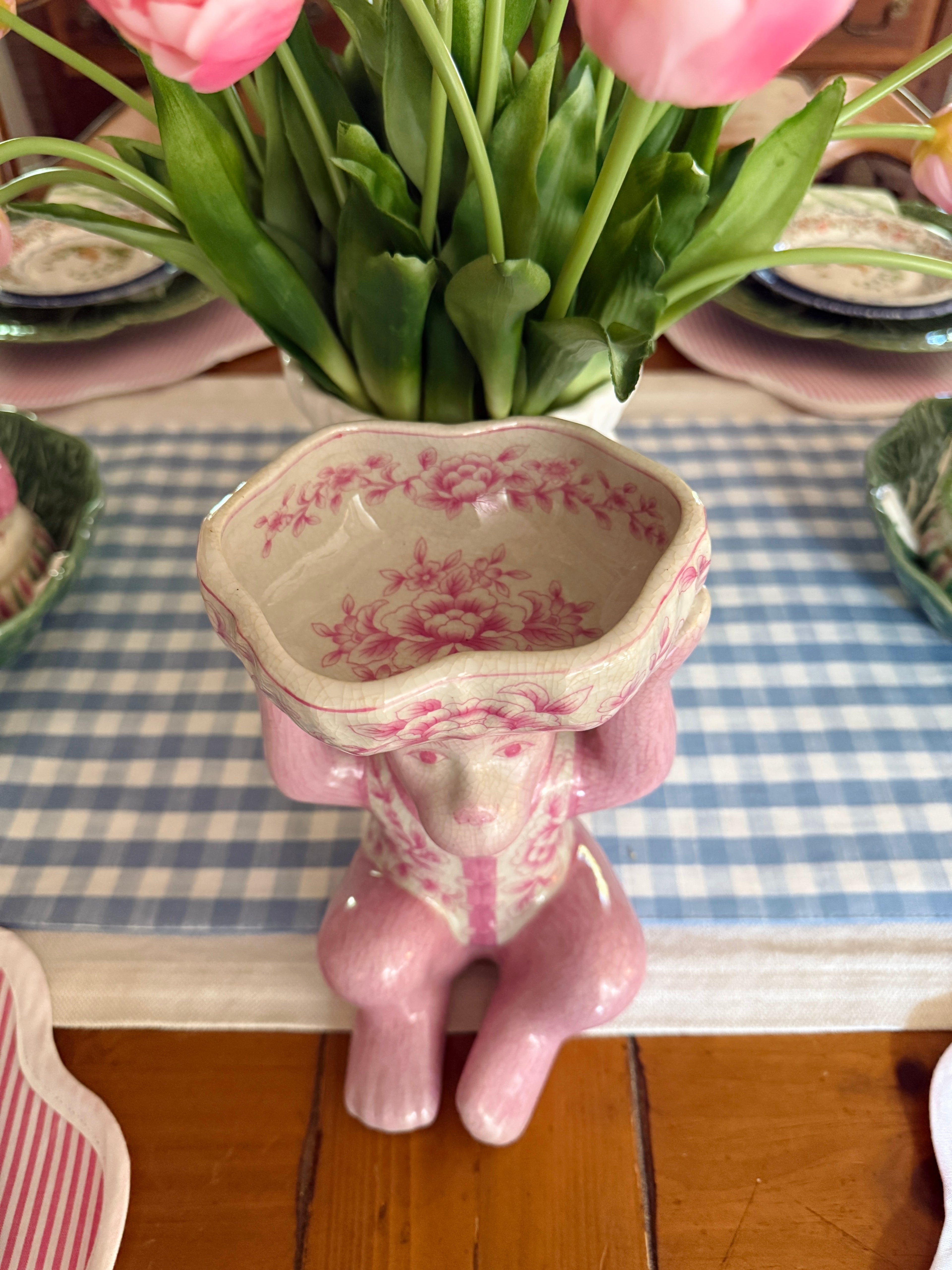 Pink porcelain chinoiserie monkey with lotus bowl
