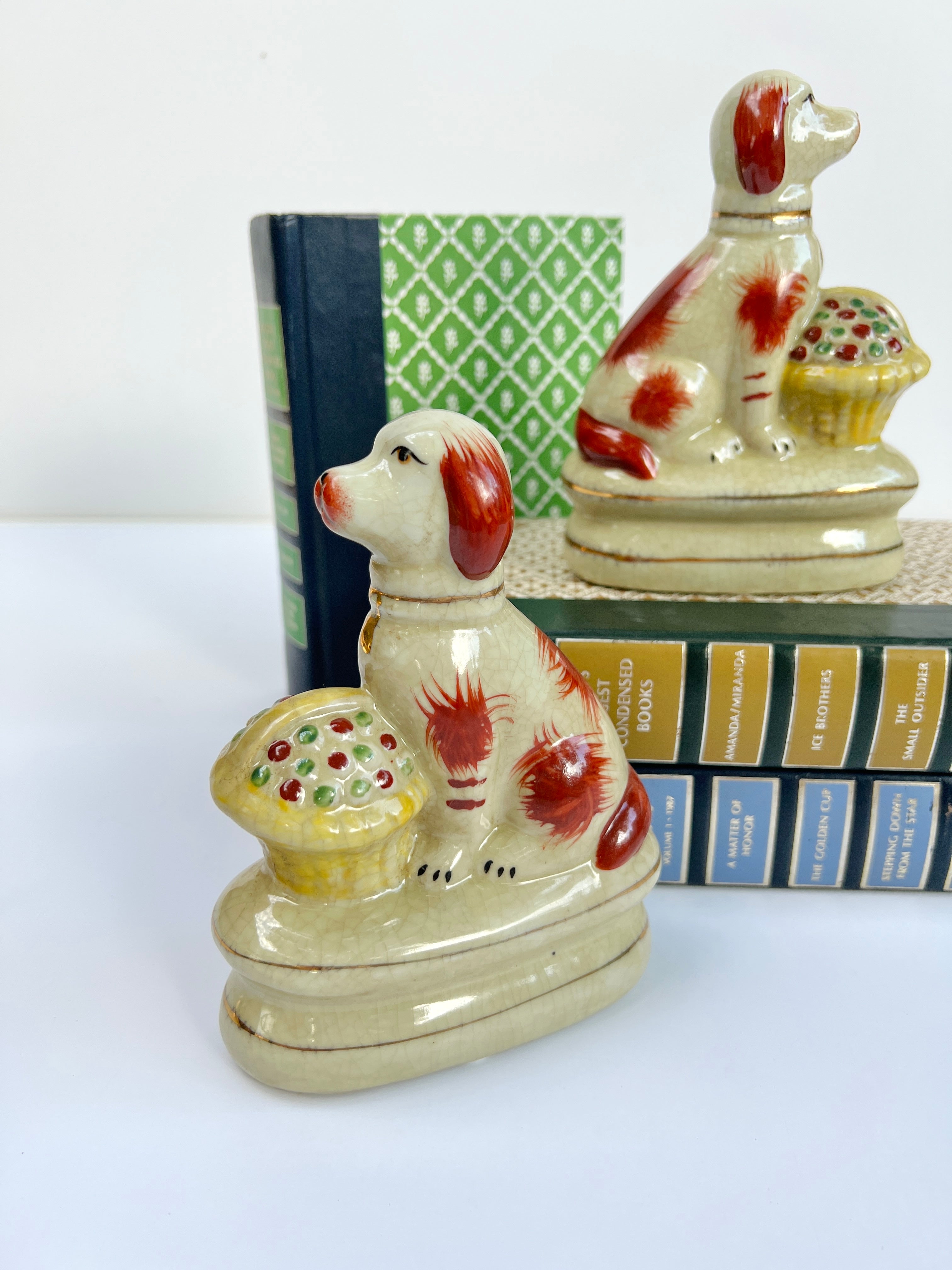 Staffordshire dog pair with flower baskets rust