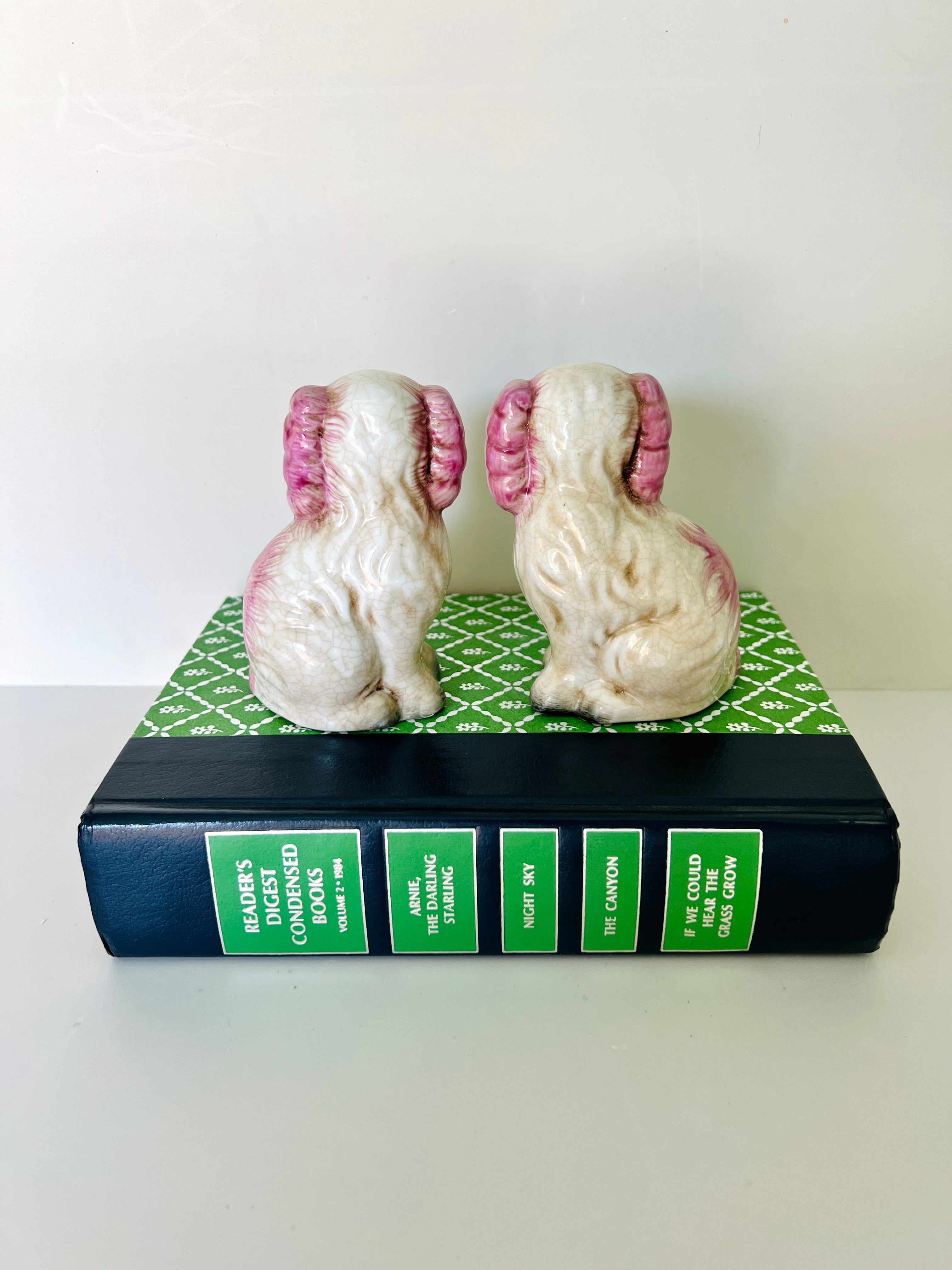 Mini pink porcelain Staffordshire dog figurine pair