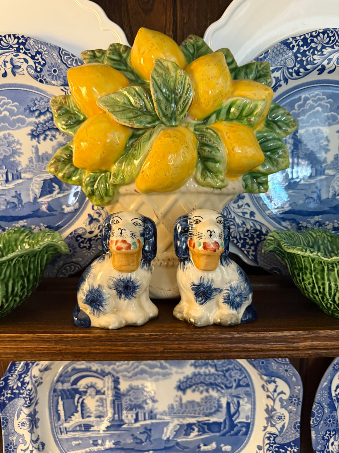 Mini blue porcelain Staffordshire dogs with flower baskets figurine pair