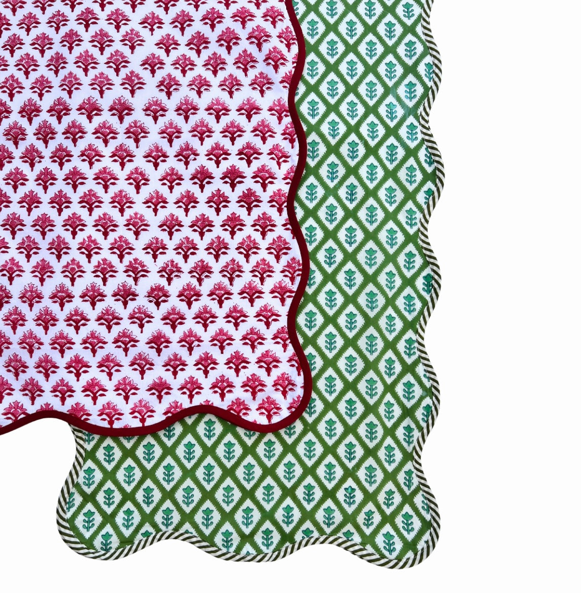 Green block print scalloped table runner with contrast piping