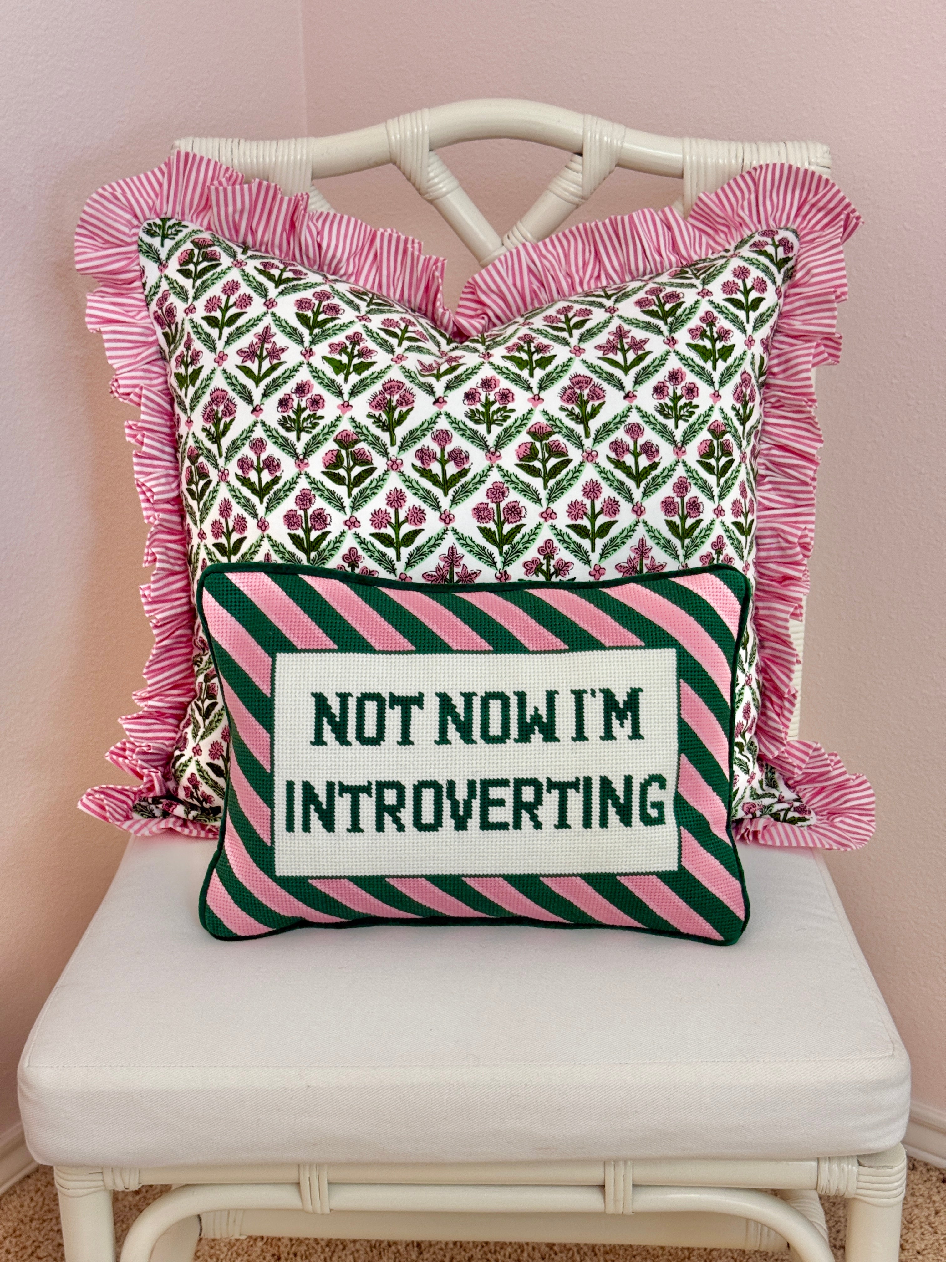 Needlepoint pillow, pink and green Introverting