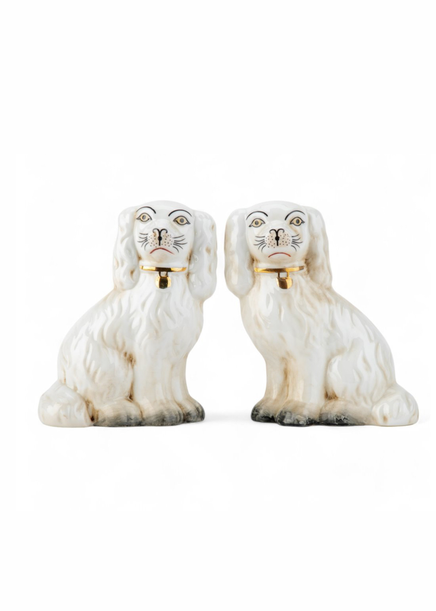 White and gold porcelainStaffordshire dog pair
