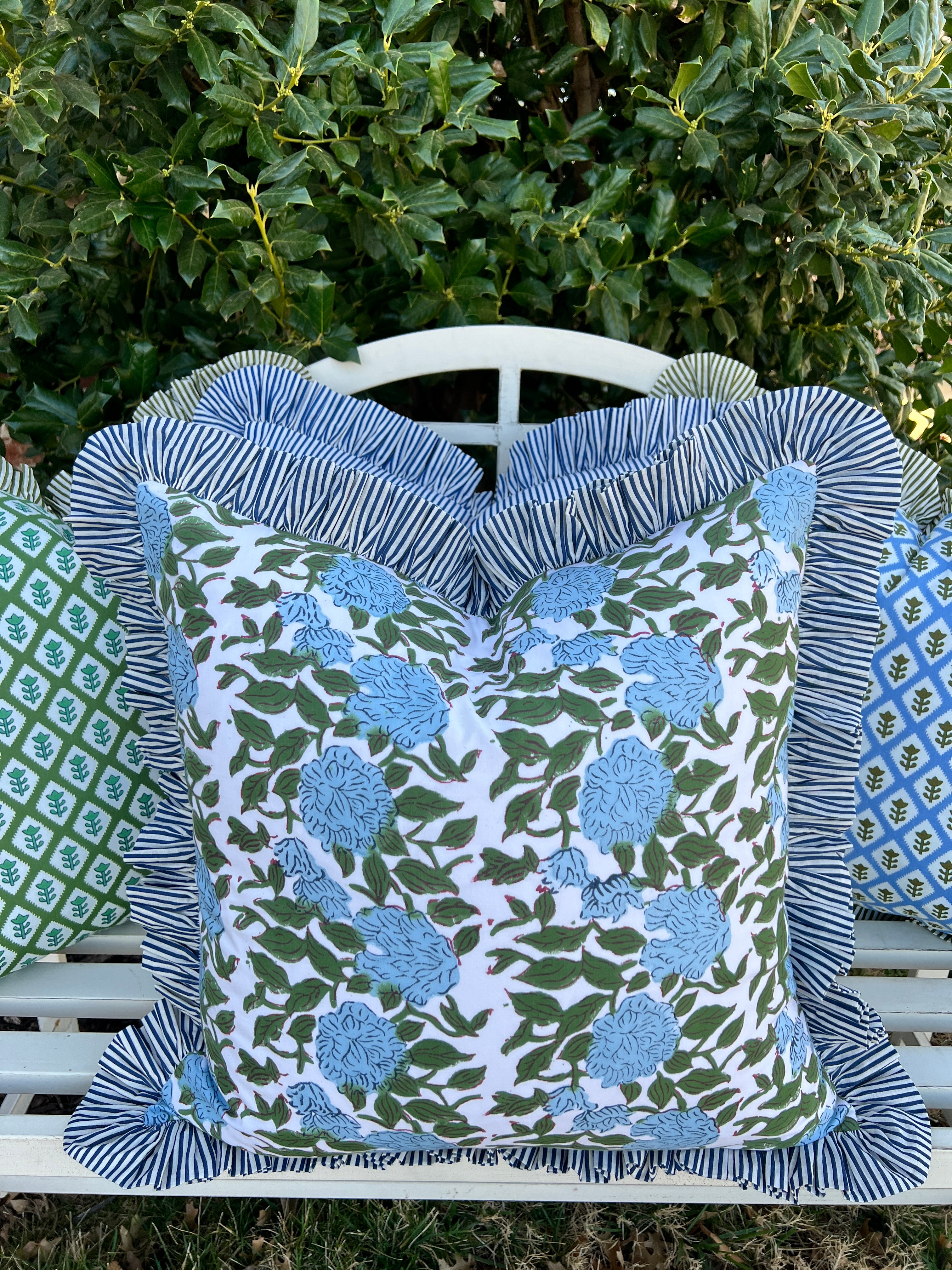 Blue and green floral block print pillow cover with ruffle trim