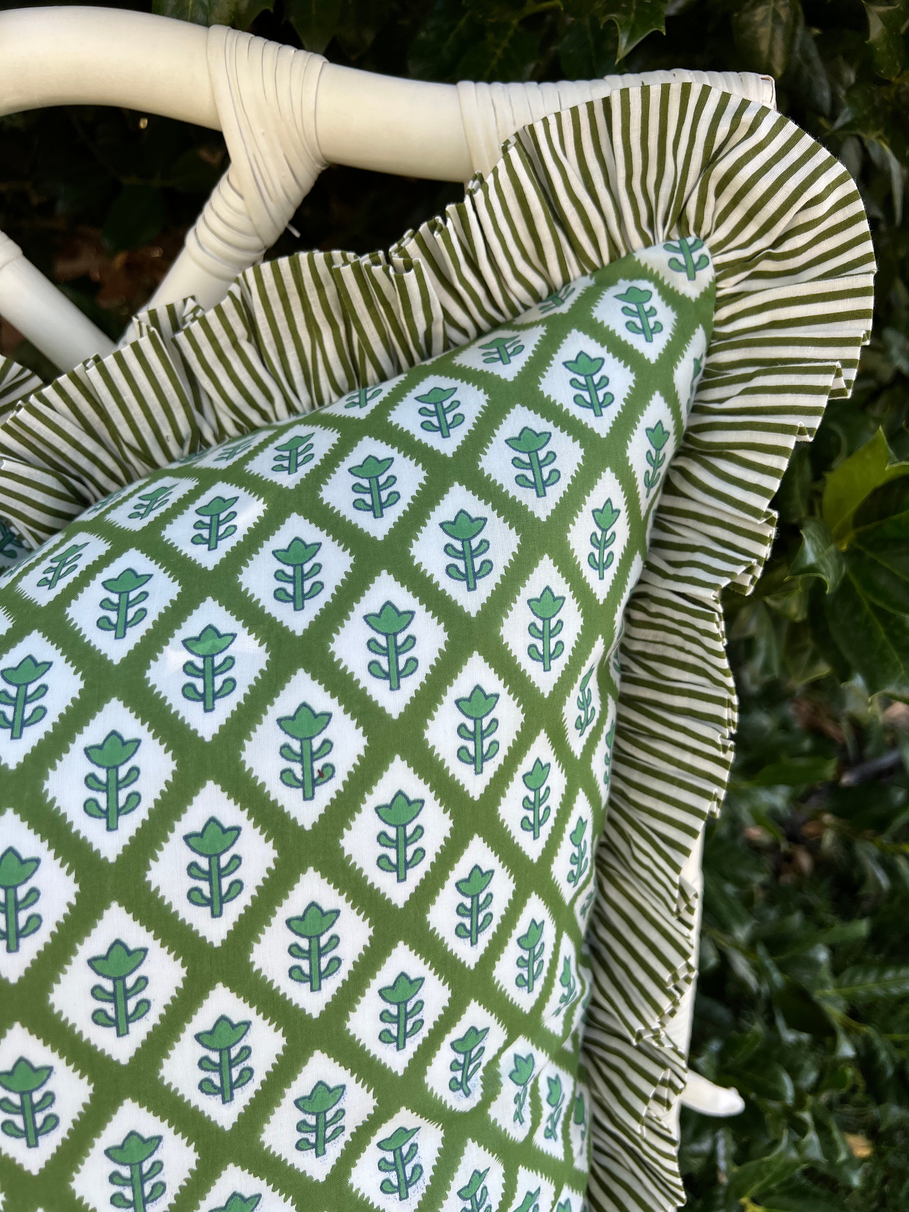 Green block print pillow cover with ruffle flange