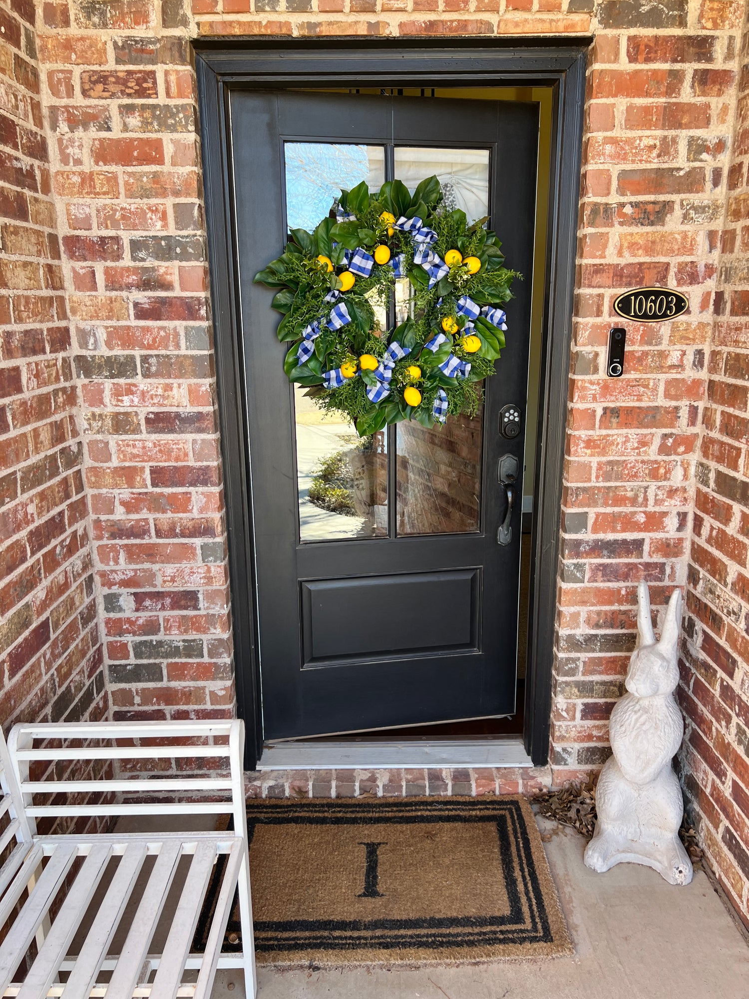 Lemon, herb, and magnolia wreath with blue gingham dupioni ribbon