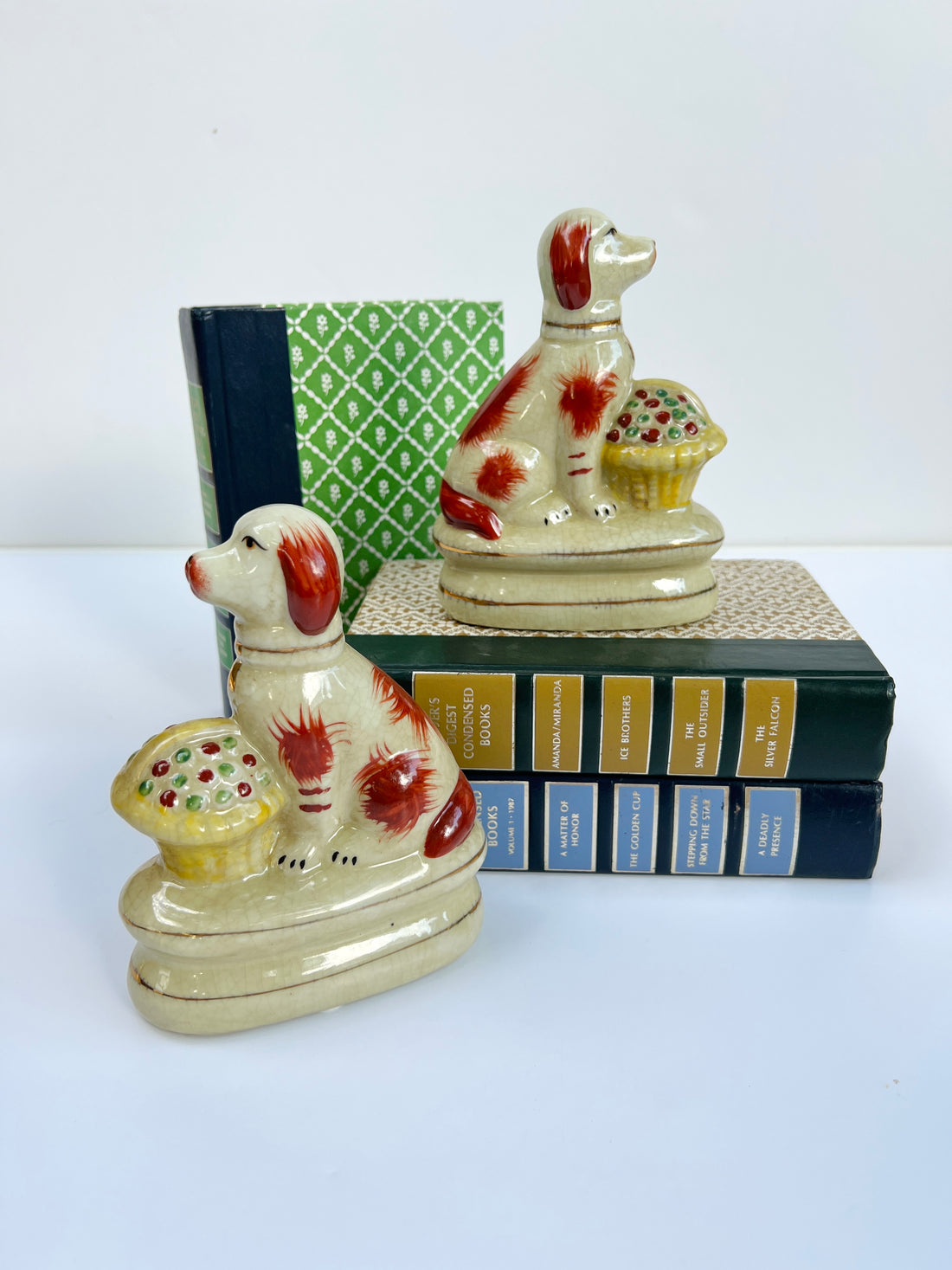 Staffordshire dog pair with flower baskets rust