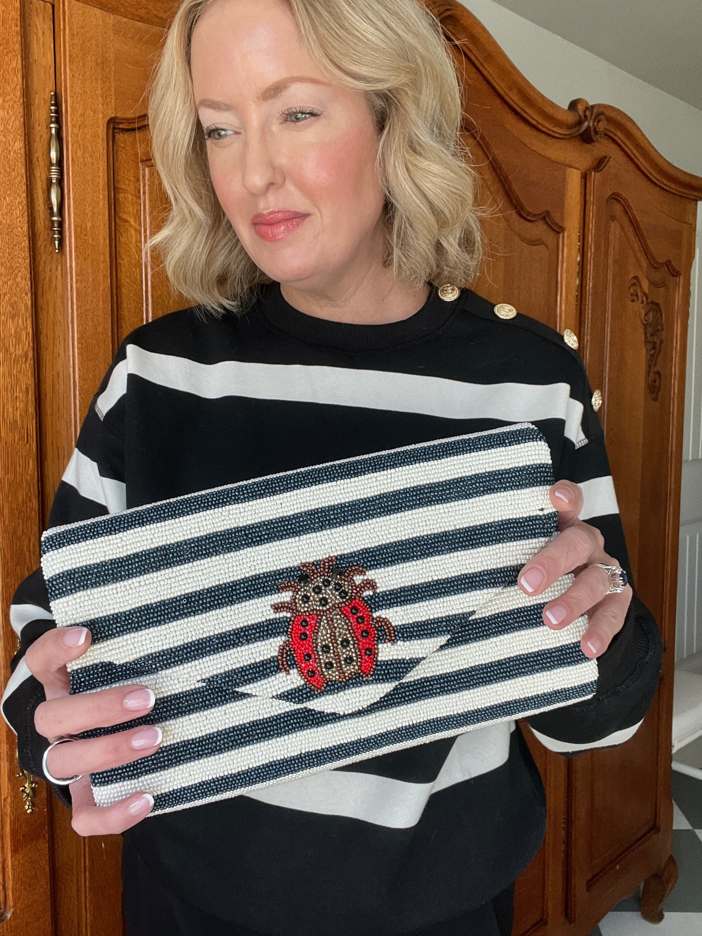 Hand beaded striped ladybug clutch