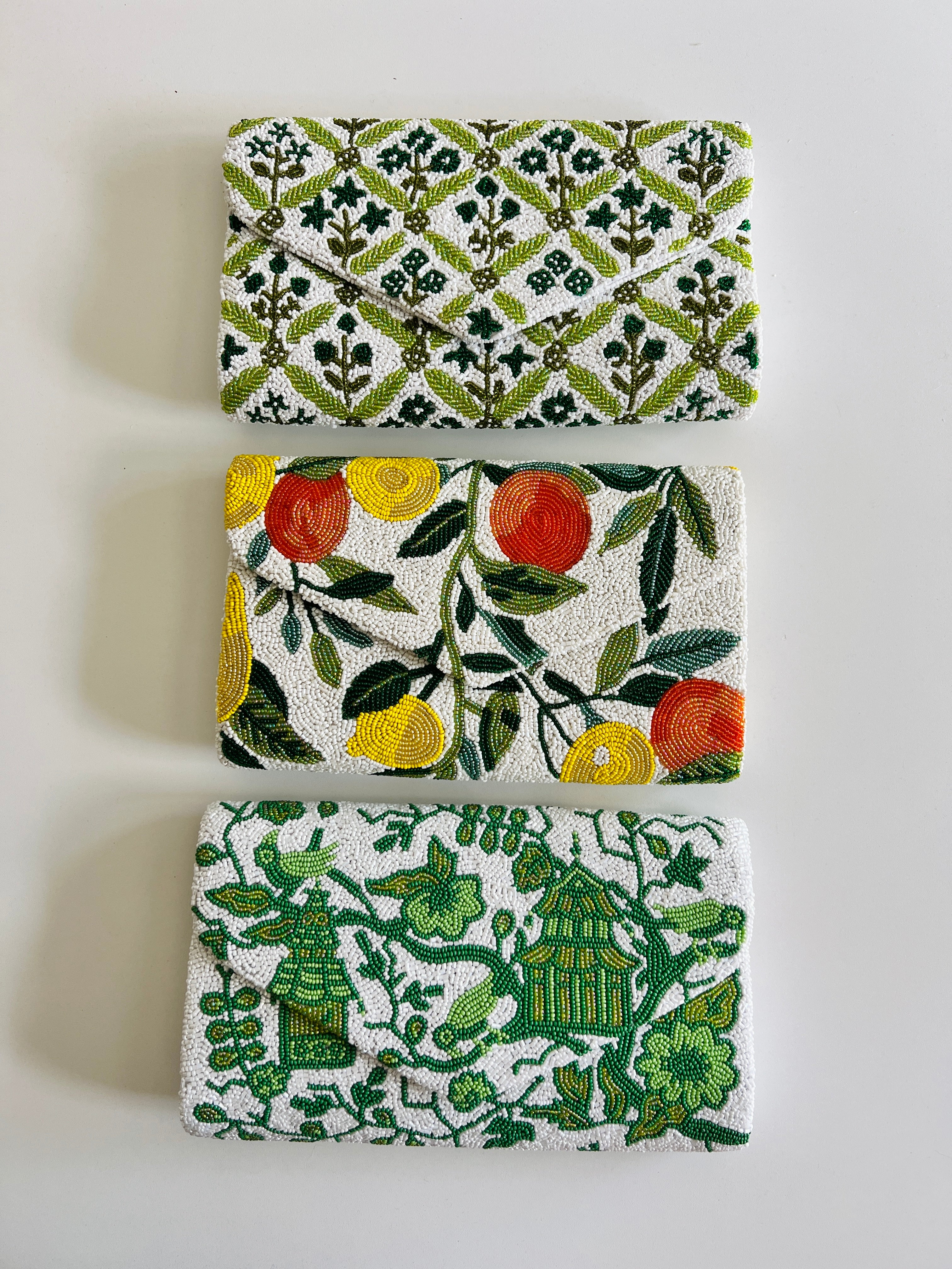 Hand beaded green and white chinoiserie clutch