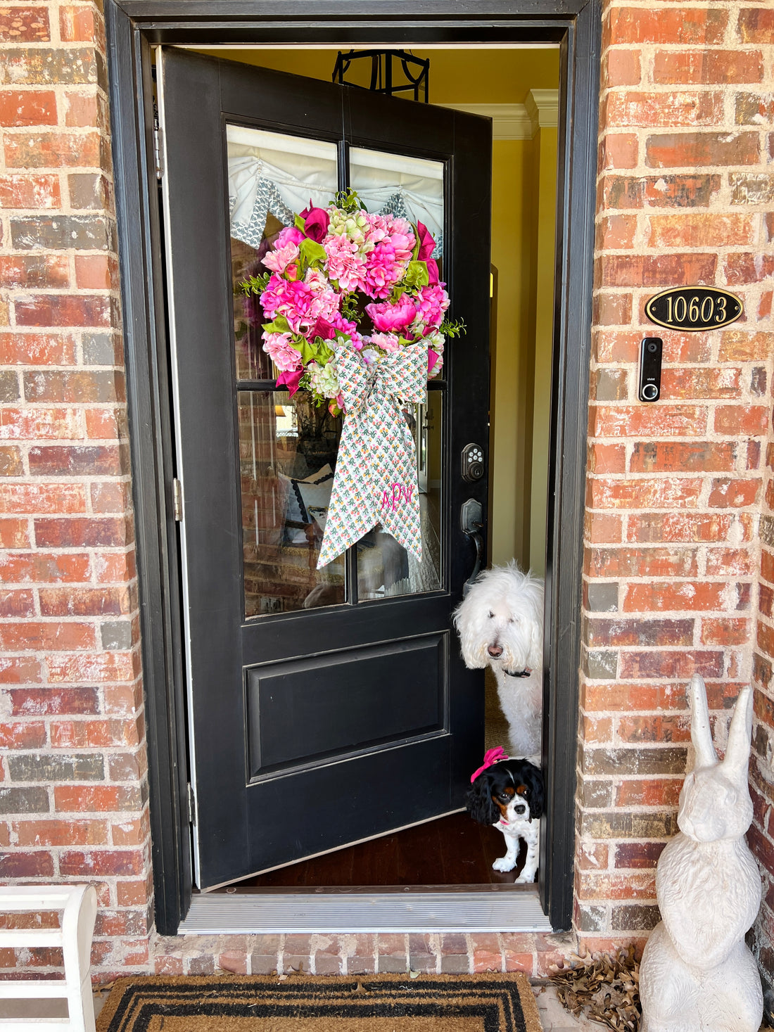 Spring pink and green hydrangea, peony, and cabbage wreath