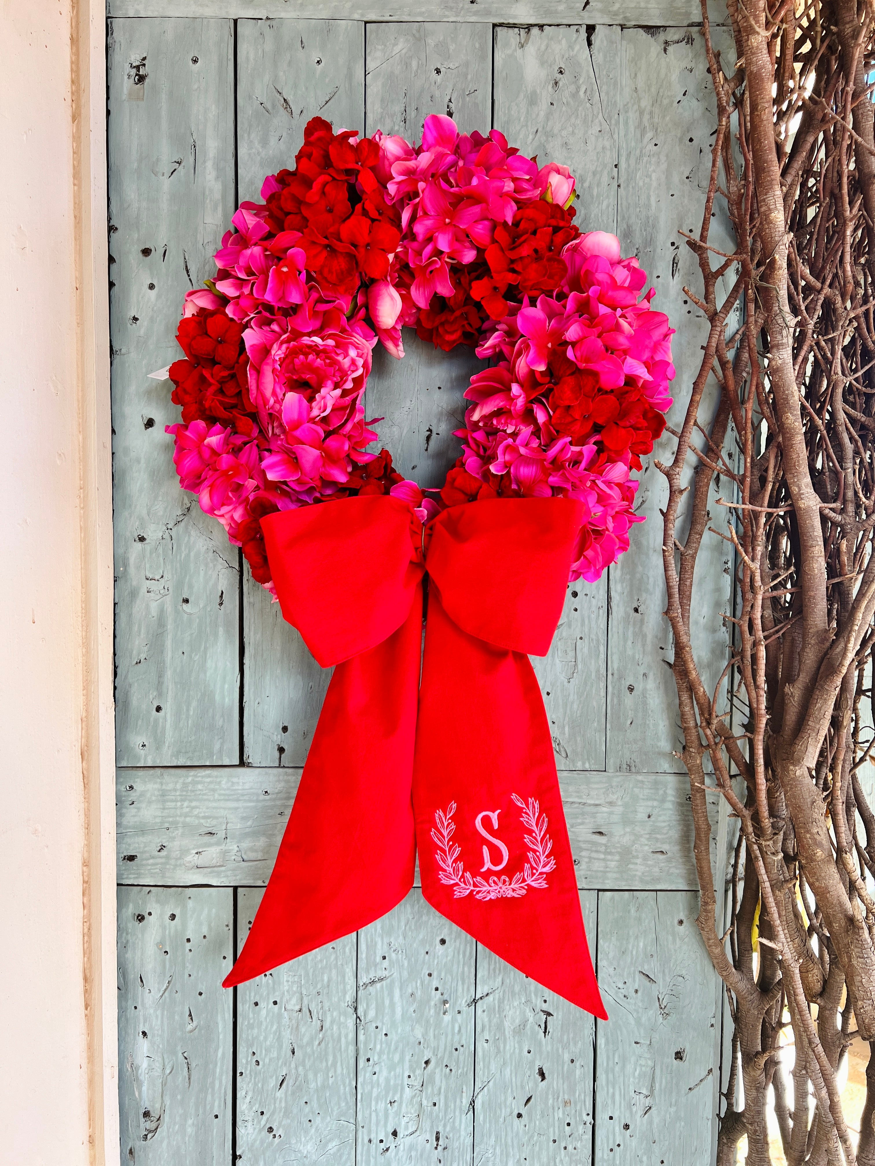 Pink and red hydrangea and peony floral wreath