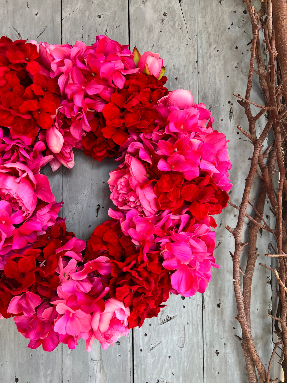 Pink and red hydrangea and peony floral wreath