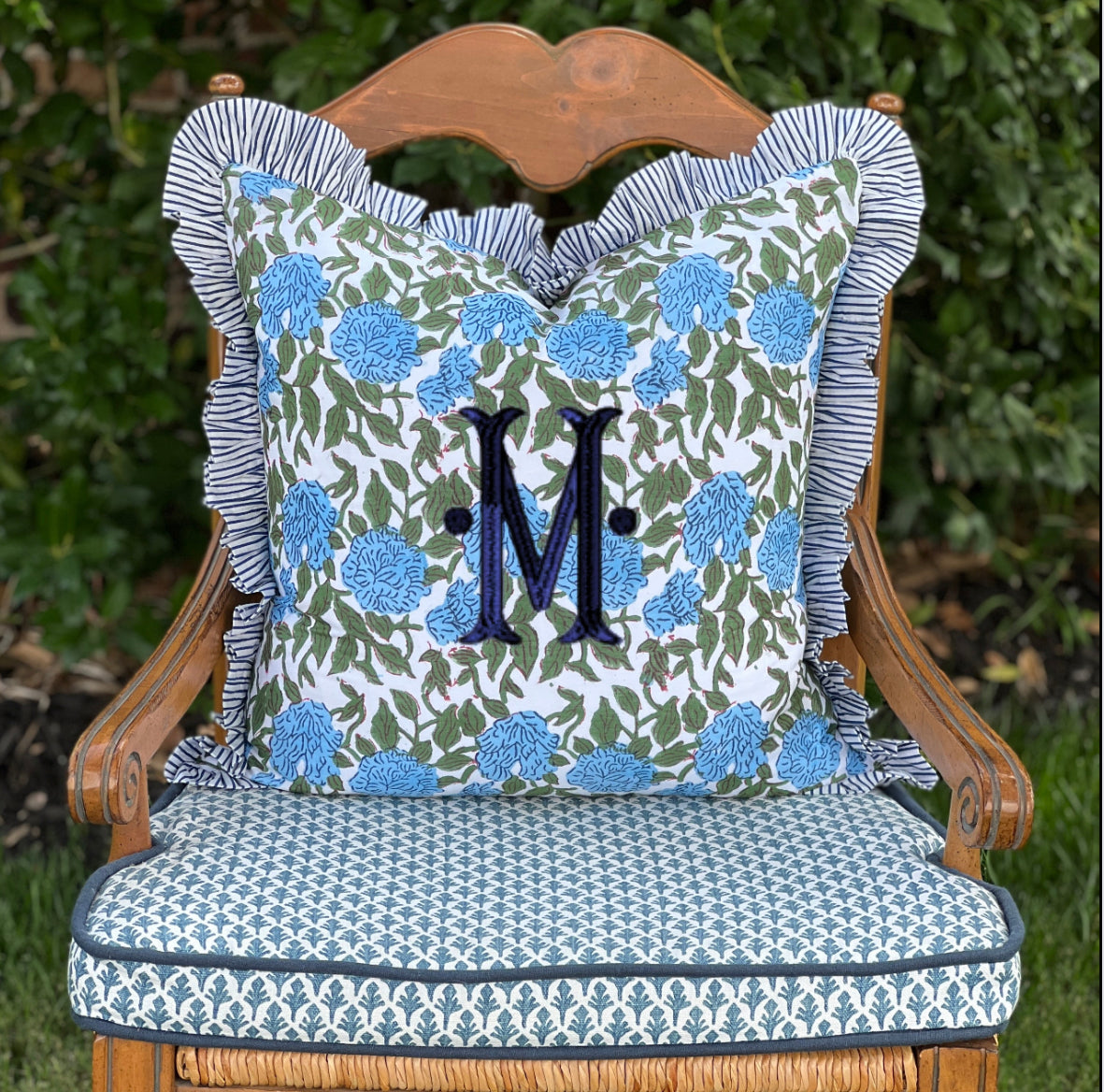 Blue and green floral block print pillow cover with ruffle trim