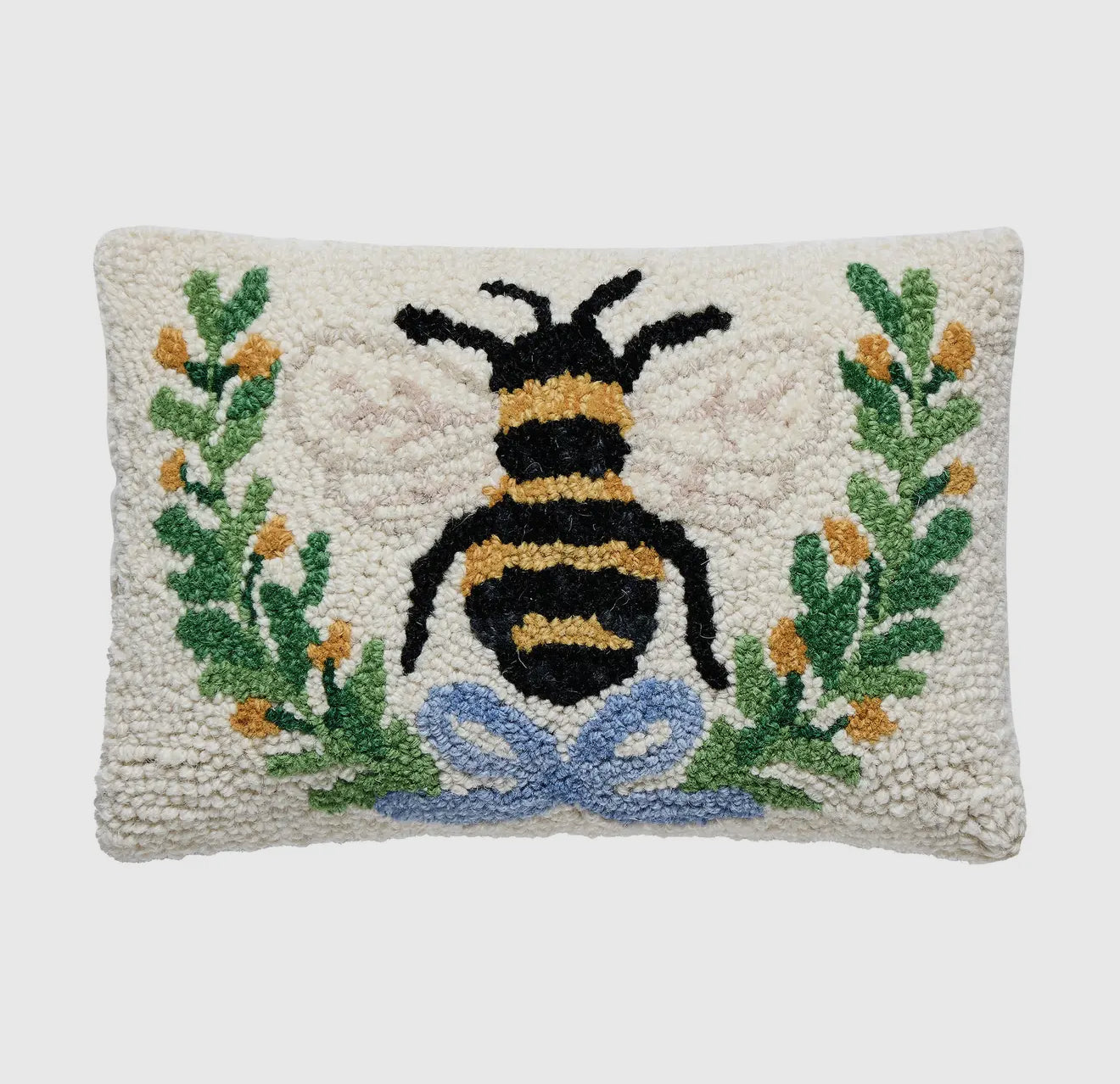 The cutest little hand hooked bee pillow