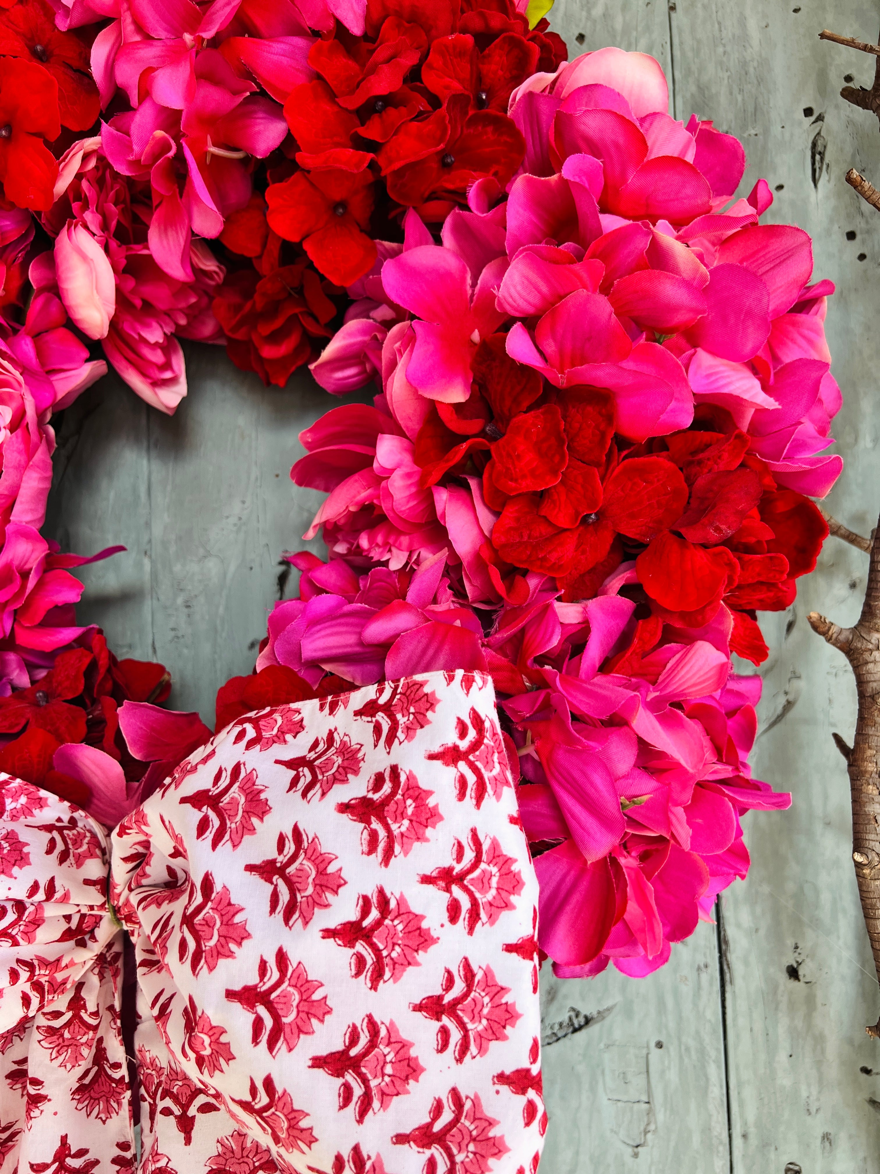 Pink and red hydrangea and peony floral wreath