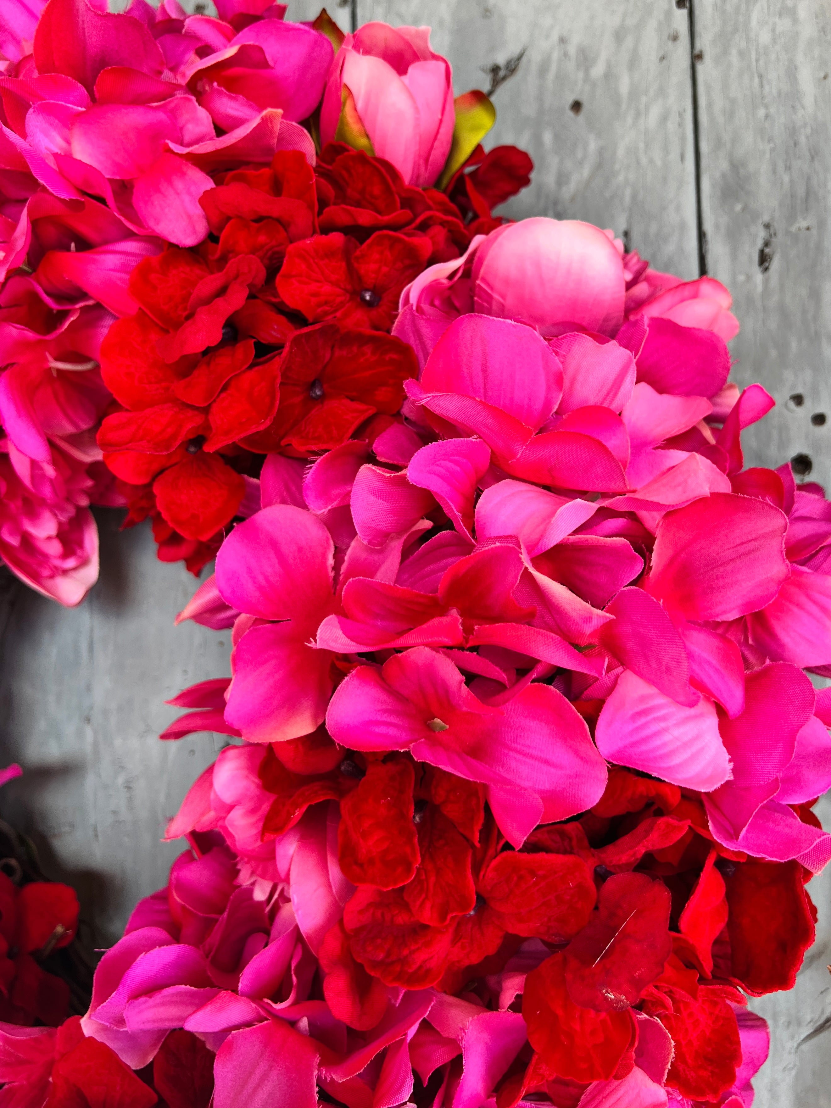 Pink and red hydrangea and peony floral wreath