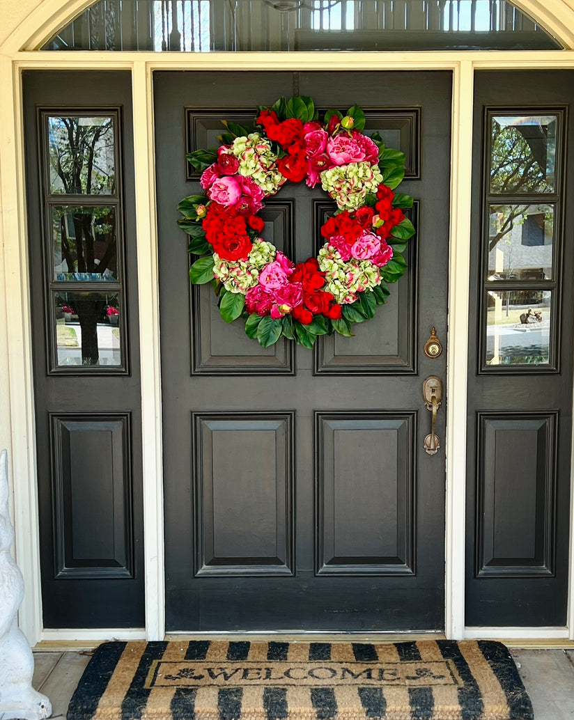 Pink, green, and red floral wreath
