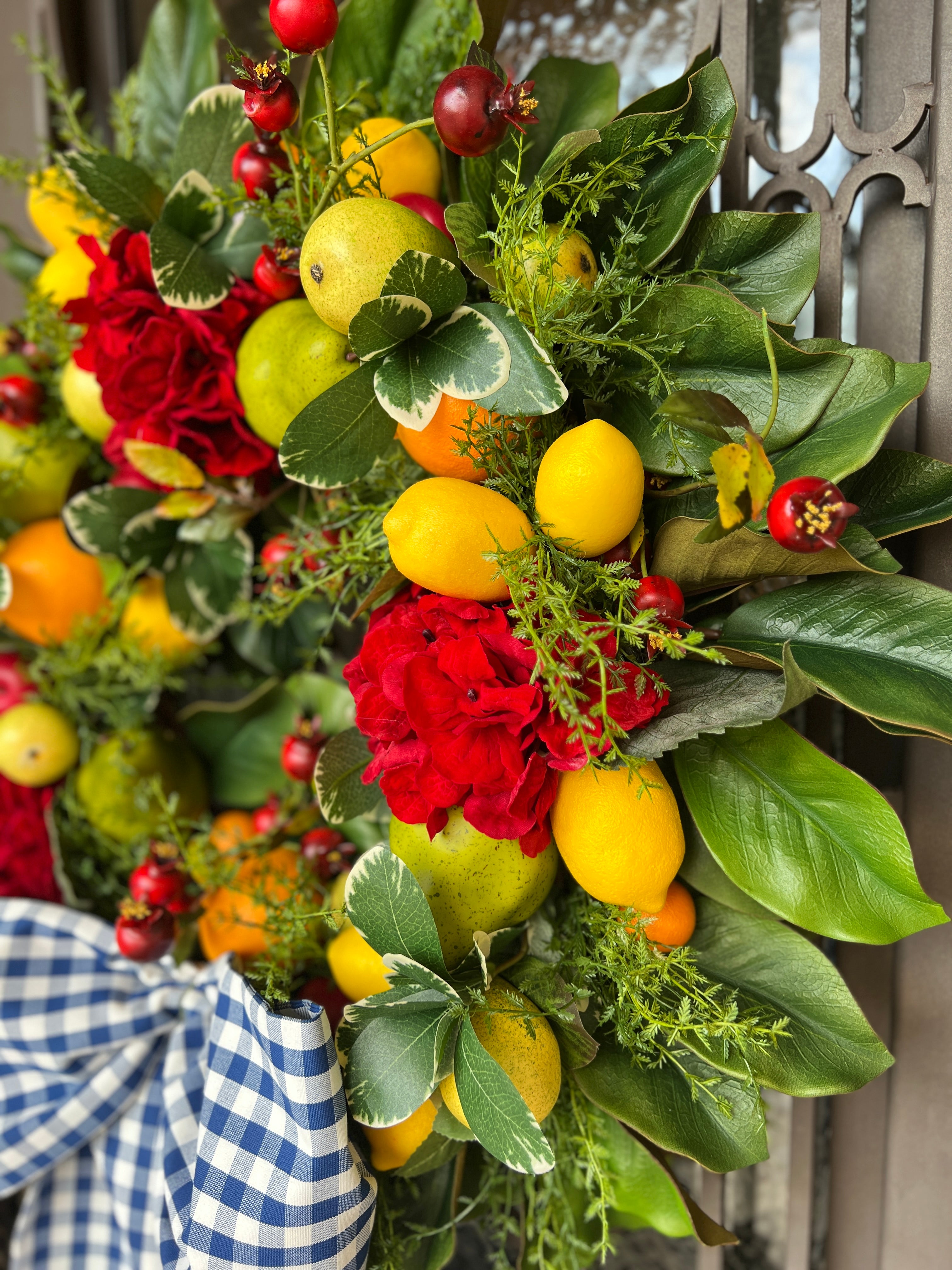 Red hydrangea, fruit, and blue gingham French Country wreath