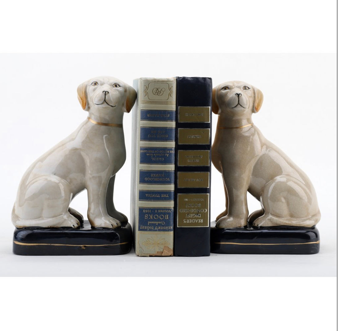 White Staffordshire dog pair on cushions