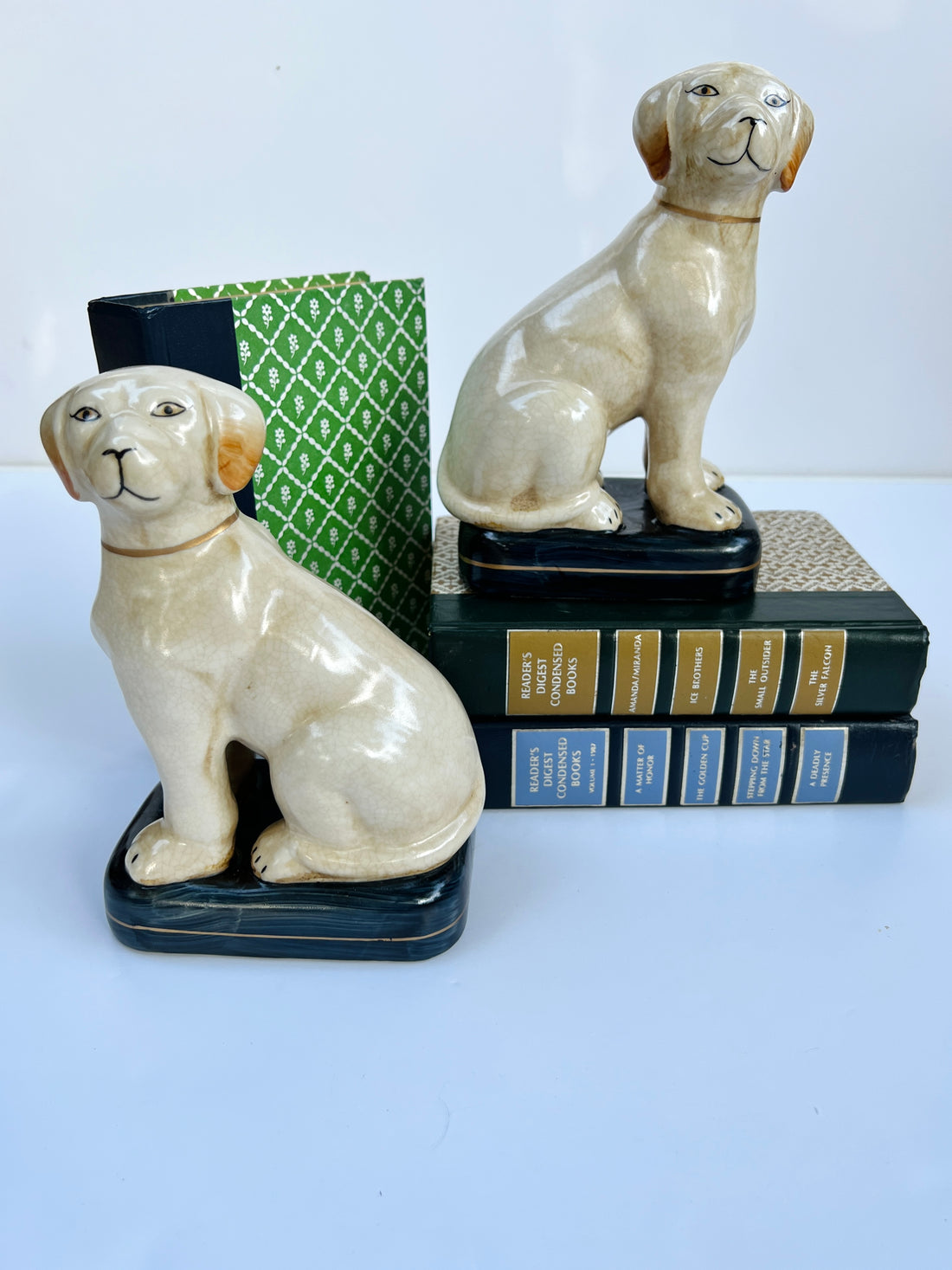 White Staffordshire dog pair on cushions