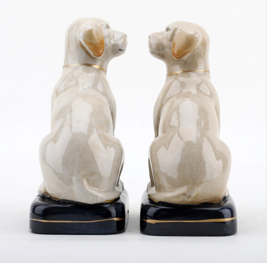 White Staffordshire dog pair on cushions