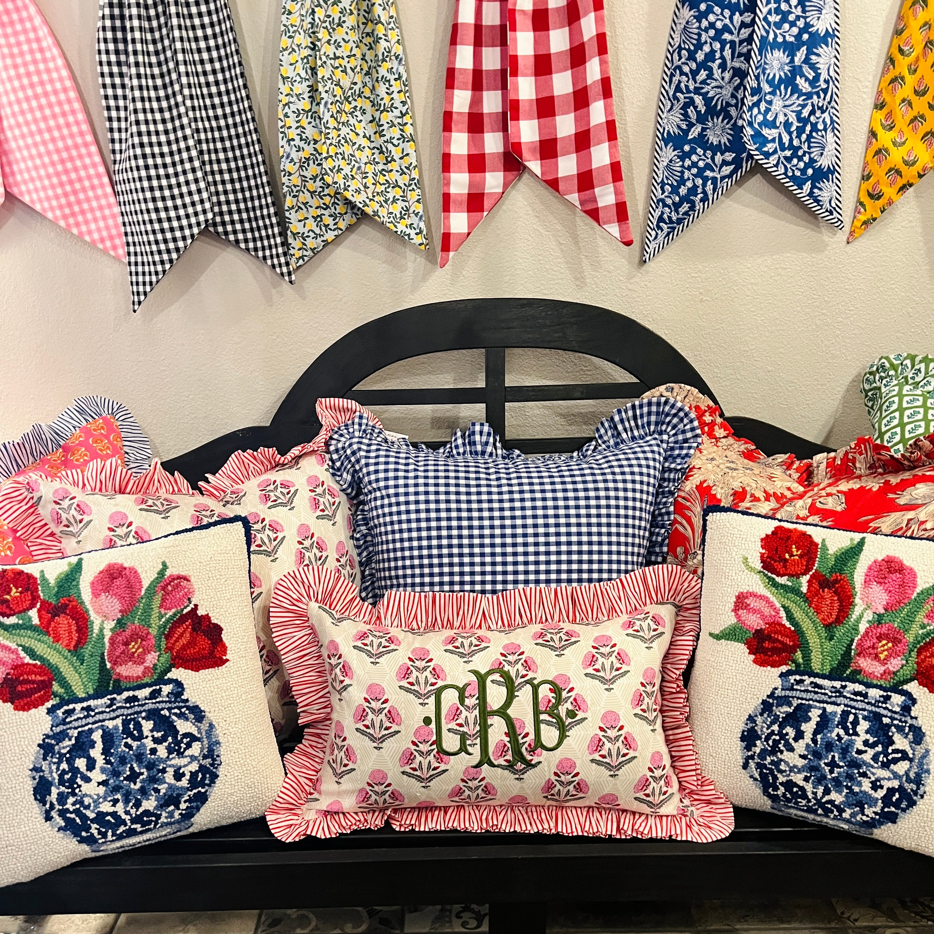 Pink and red floral block print ruffle pillow