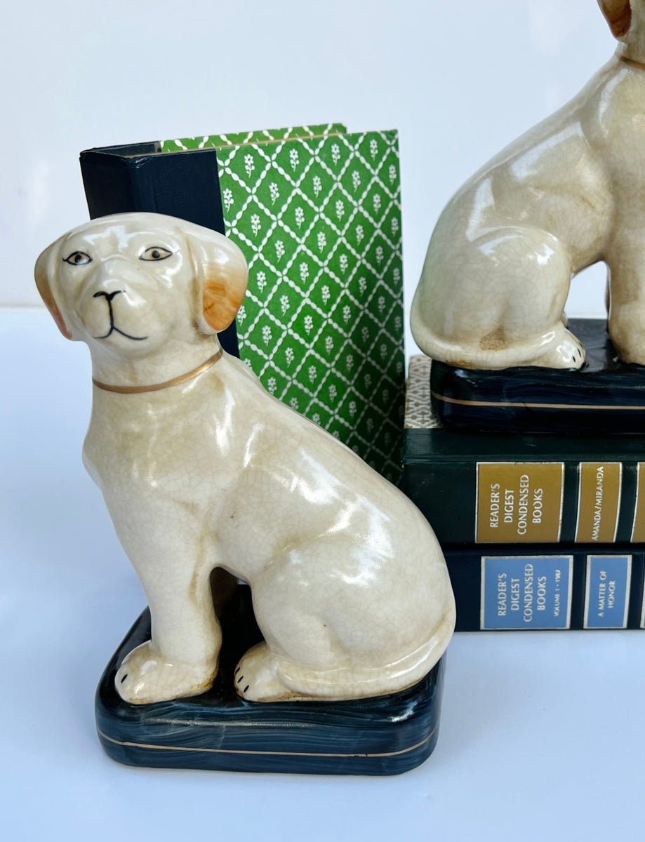 White Staffordshire dog pair on cushions