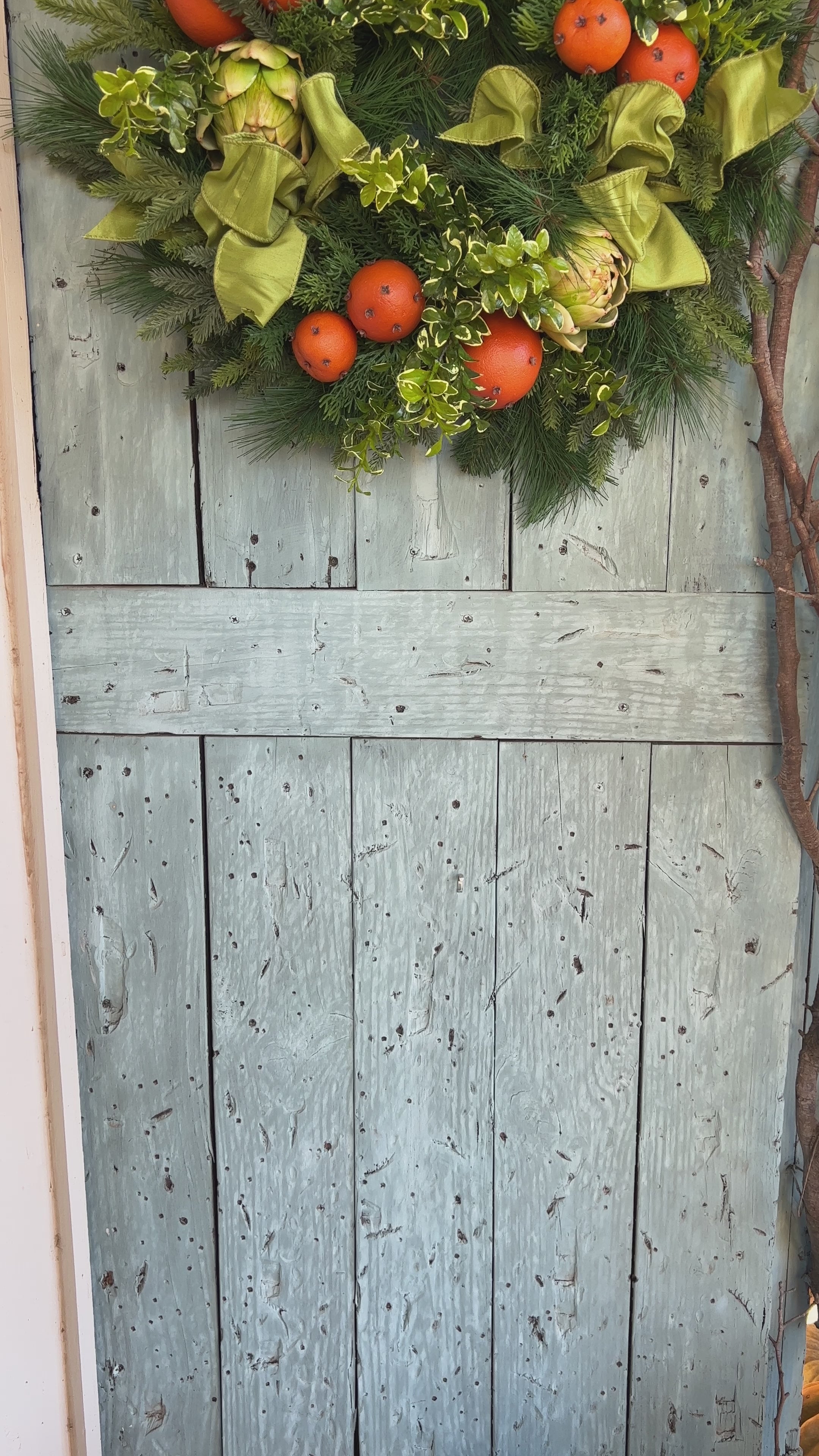 Orange pomander and artichoke wreath
