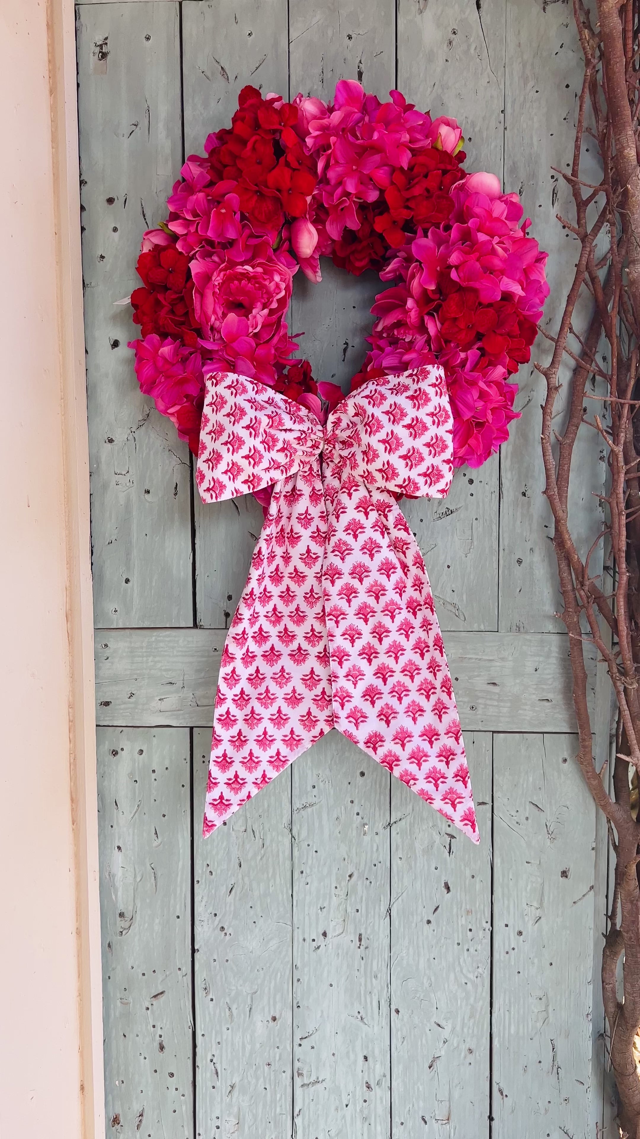Pink and red hydrangea and peony floral wreath