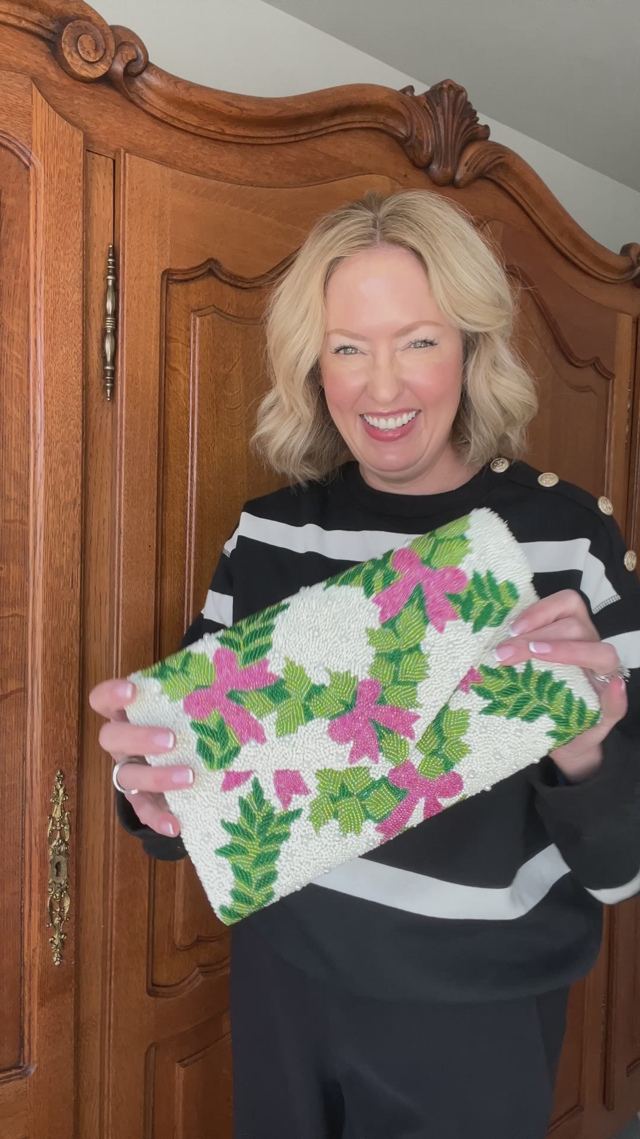 Hand beaded pink bows and green trellis clutch