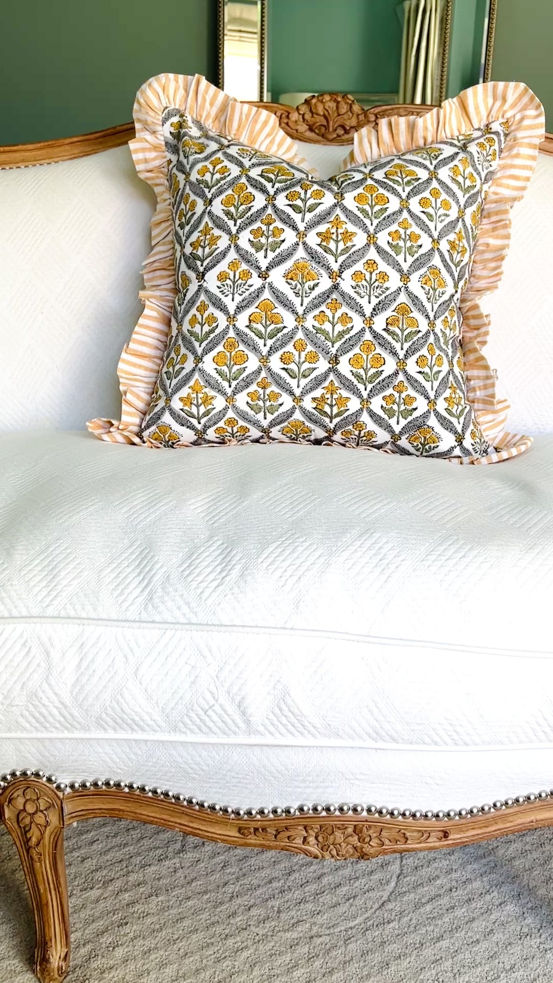 Yellow block print pillow cover with ruffle trim