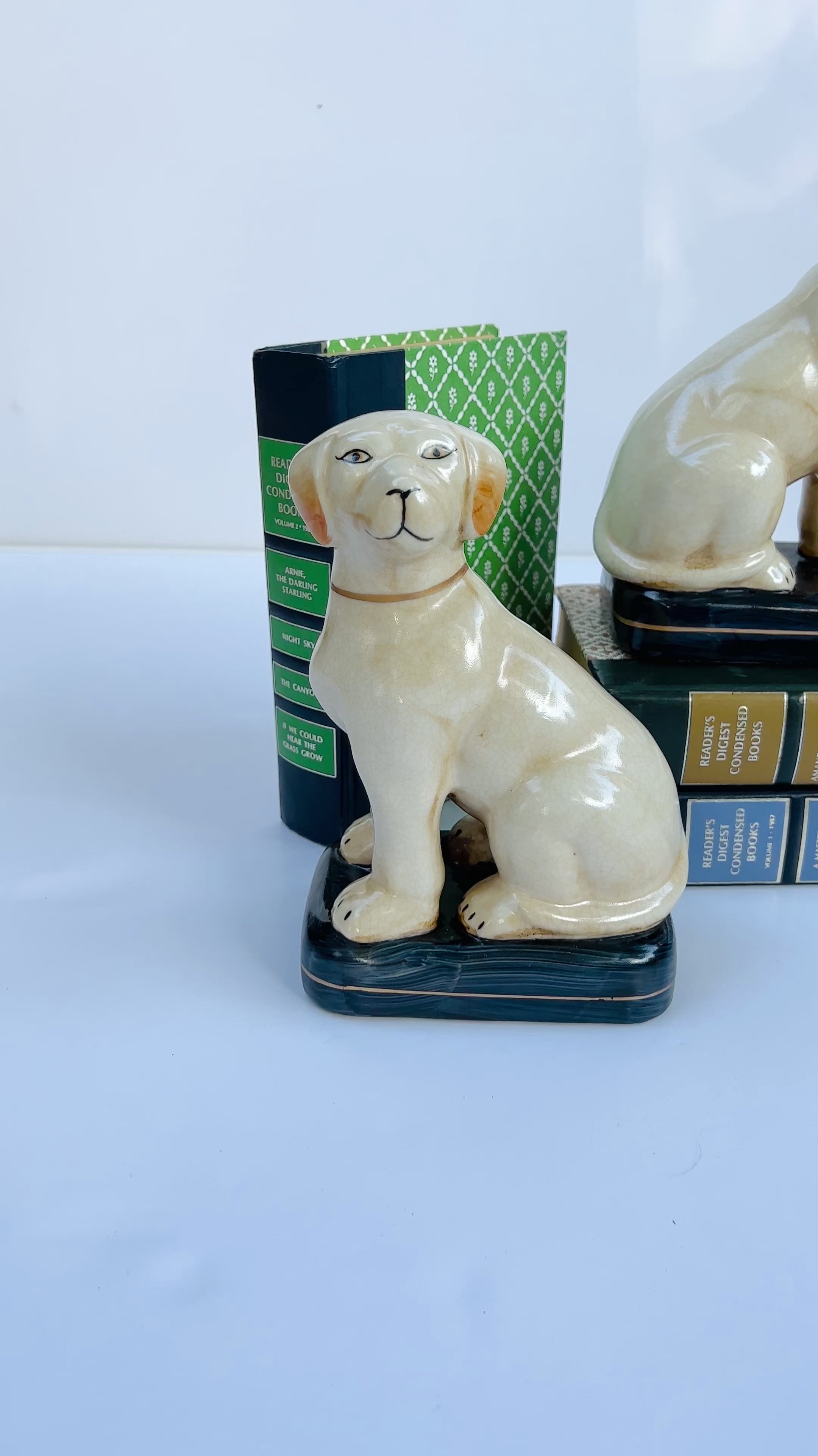 White Staffordshire dog pair on cushions