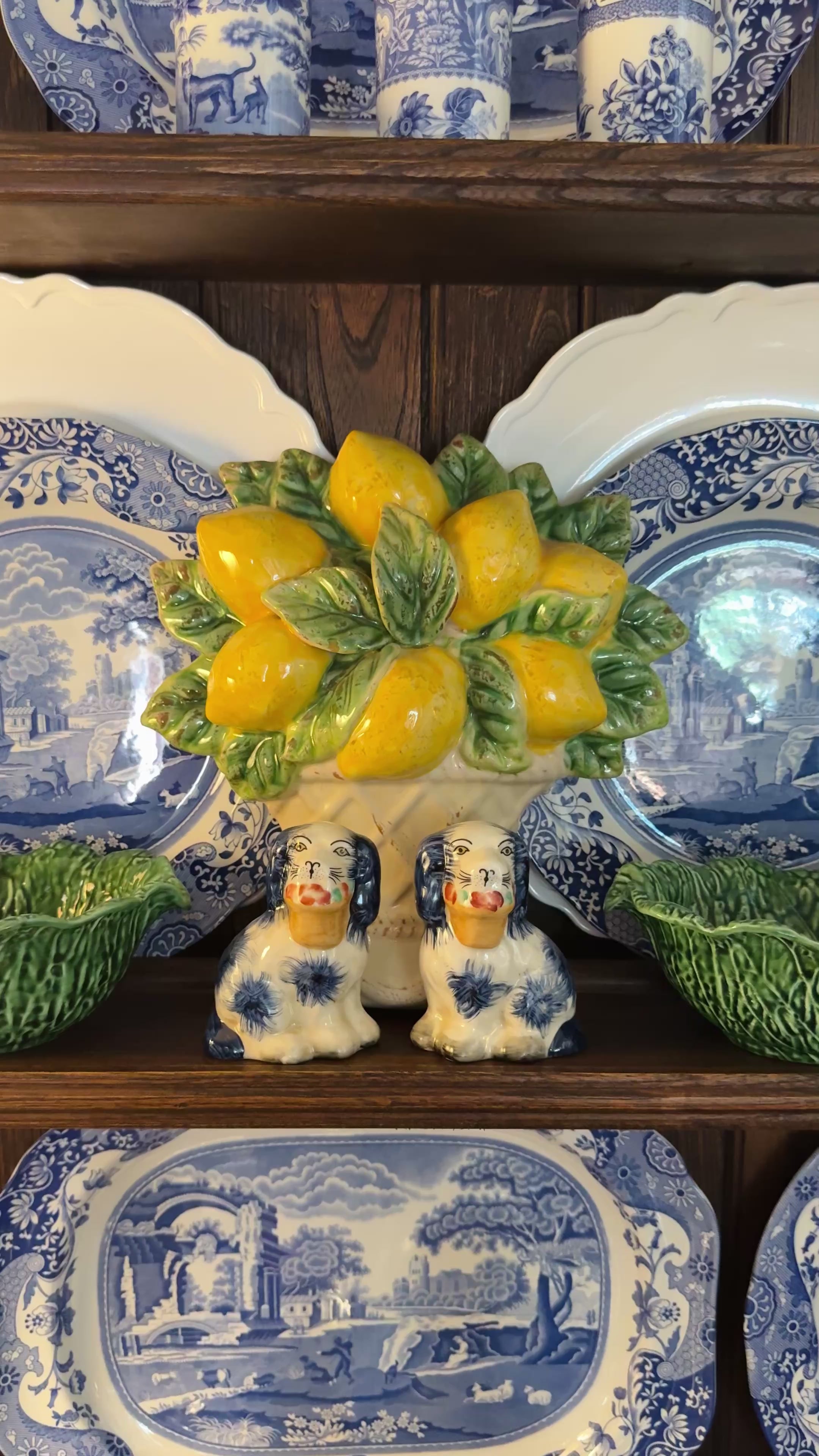 Mini blue porcelain Staffordshire dogs with flower baskets figurine pair