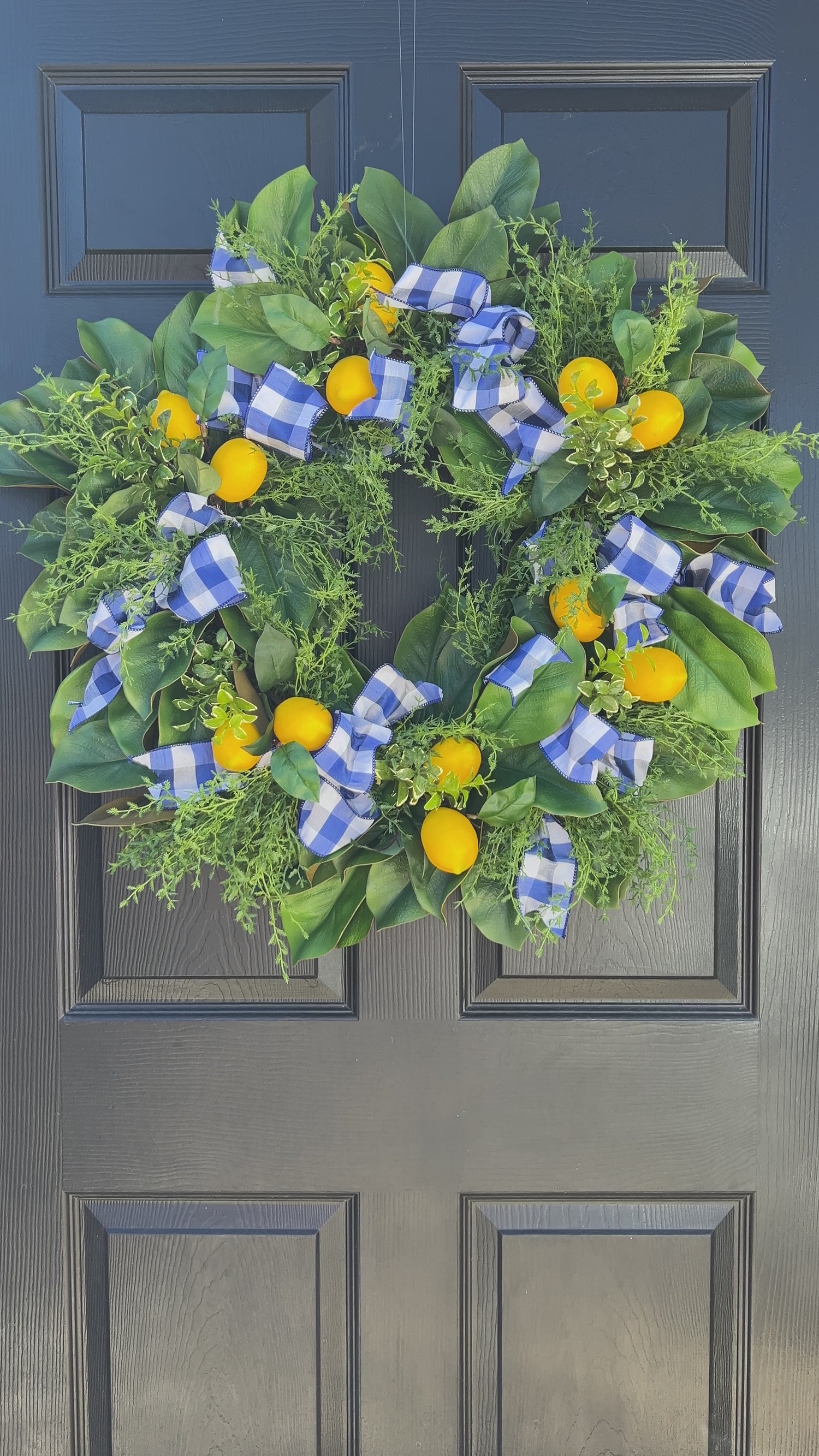Lemon, herb, and magnolia wreath with blue gingham dupioni ribbon