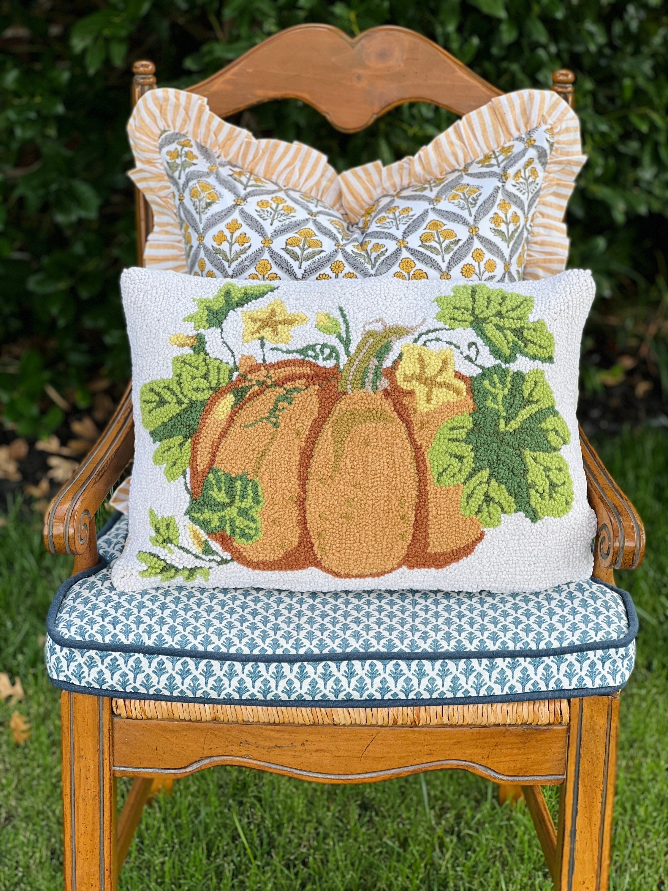 Yellow block print pillow cover with ruffle trim
