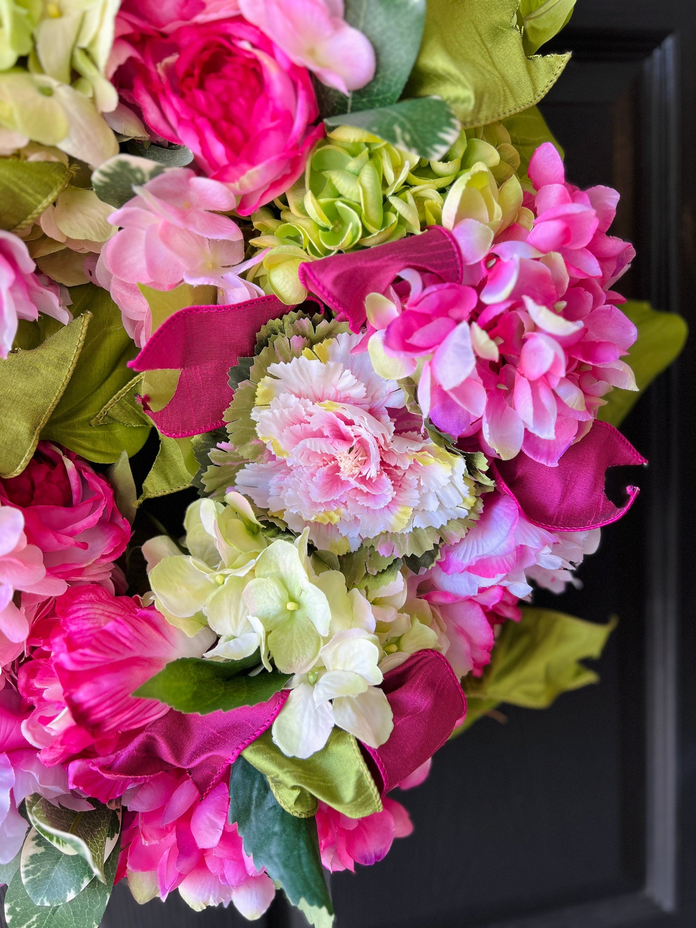 Spring pink and green hydrangea, peony, and cabbage wreath