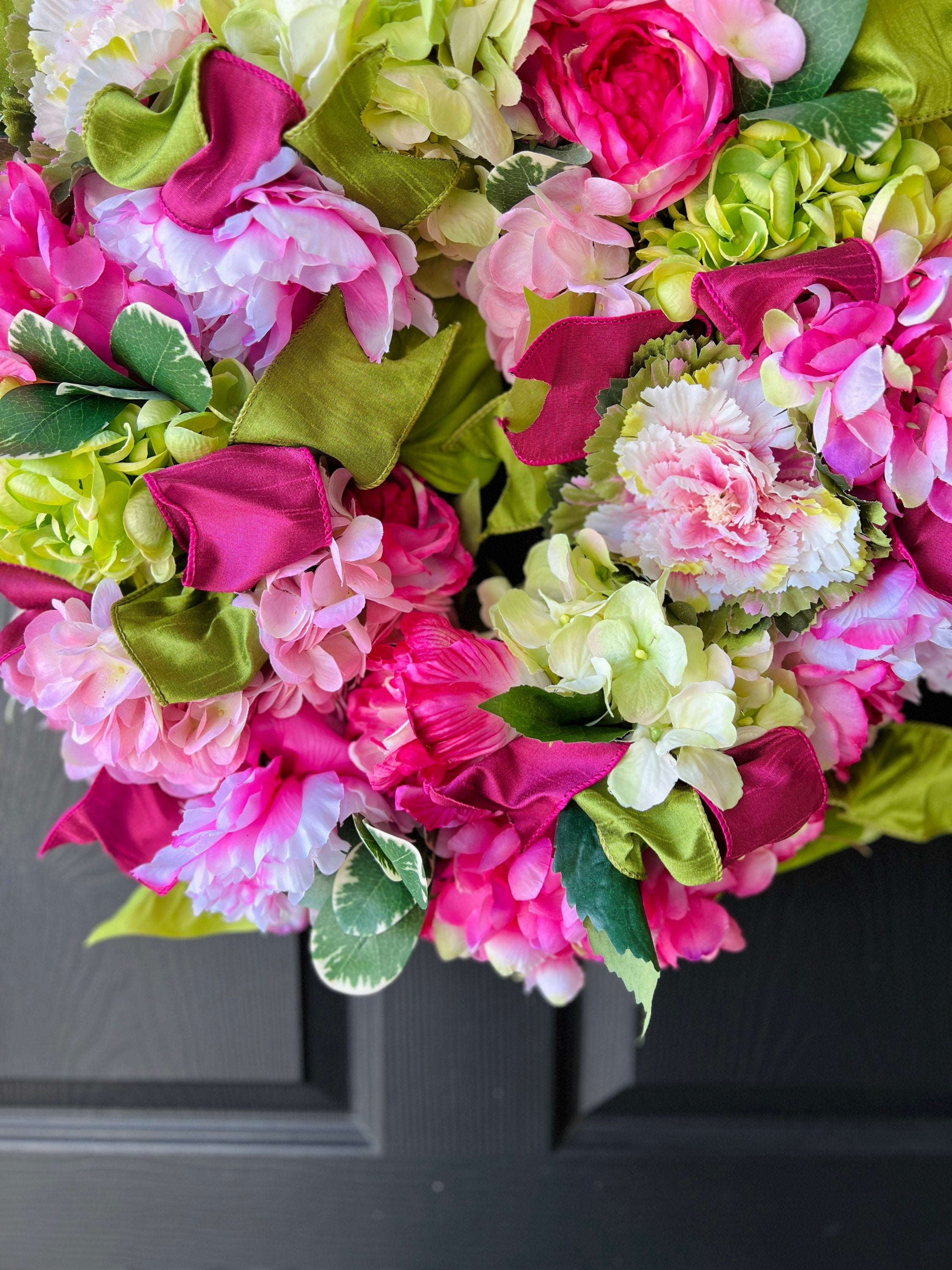 Spring pink and green hydrangea, peony, and cabbage wreath