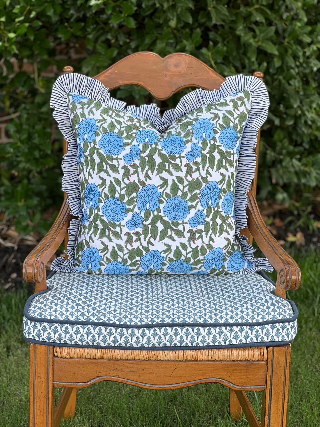 Blue and green floral block print pillow cover with ruffle trim