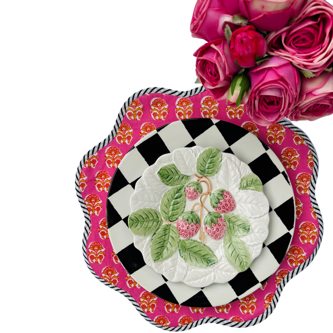 Scalloped bright pink block print placemat set with black and white piping