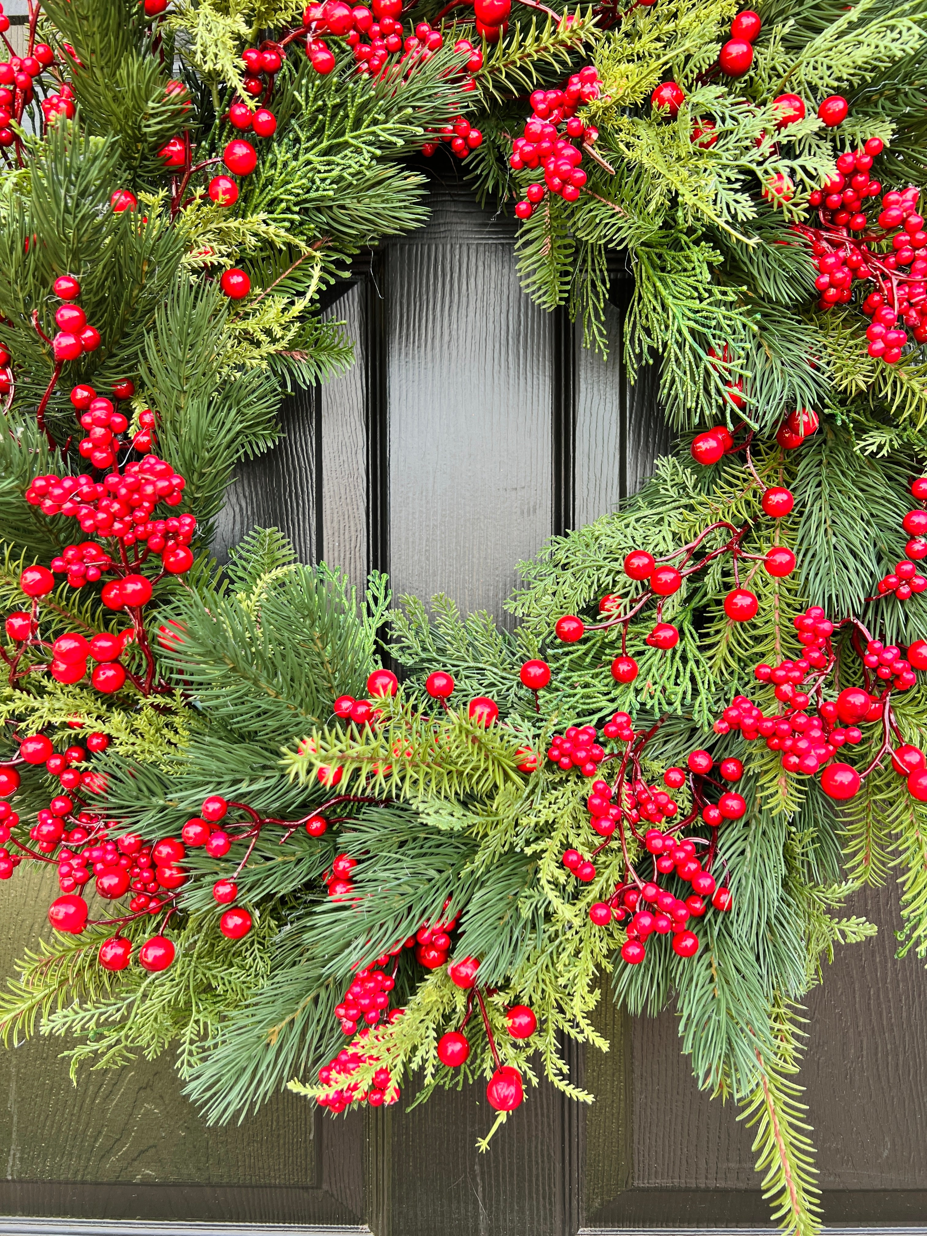 Holiday red berry and pinecone wreath 28”